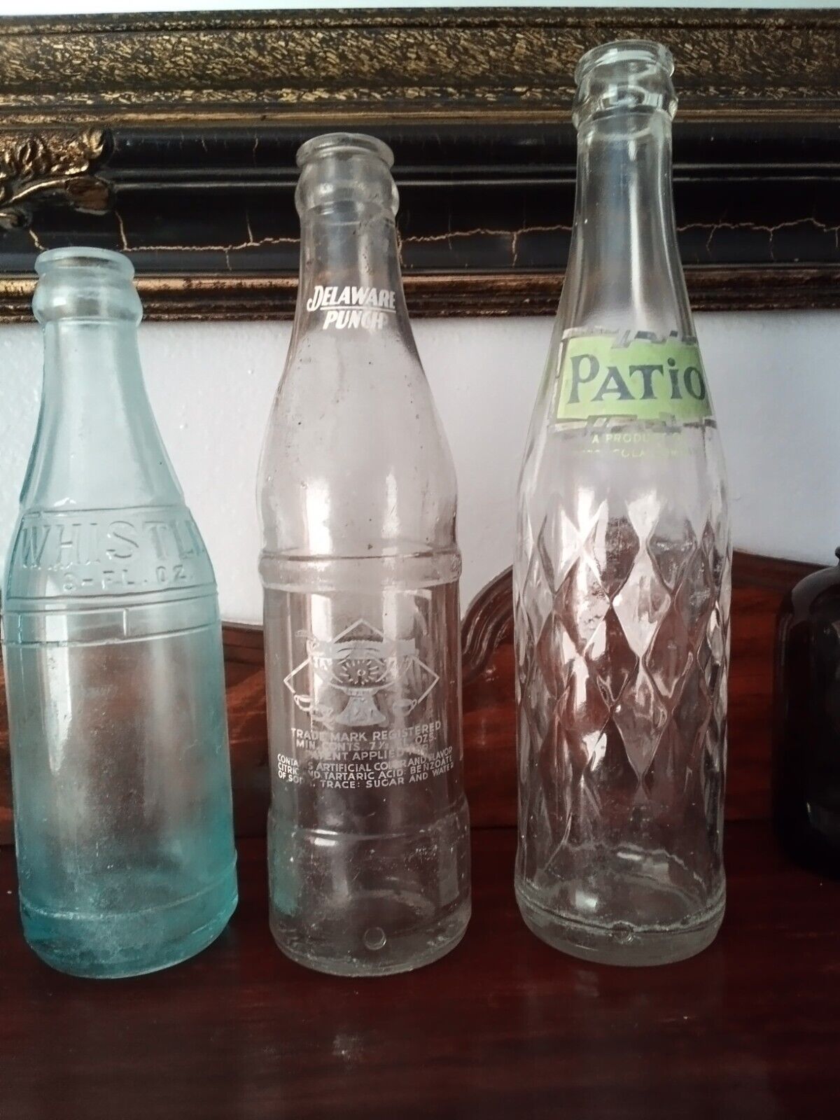 LOT OF 3 VINTAGE SODA BOTTLES: WHISTLE,DELAWARE PUNCH & PATIO (PEPSI PRODUCT)