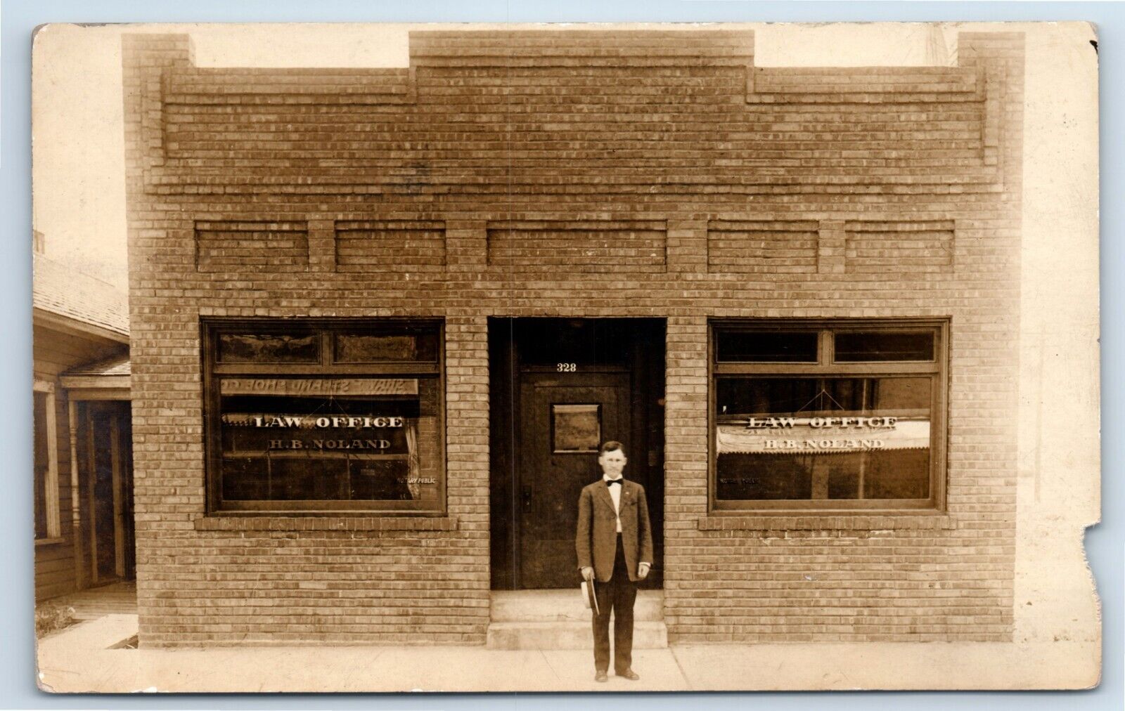 Postcard Man in Bow Tie and Flat Top Hat at Law Office of H. B. Noland RPPC 328