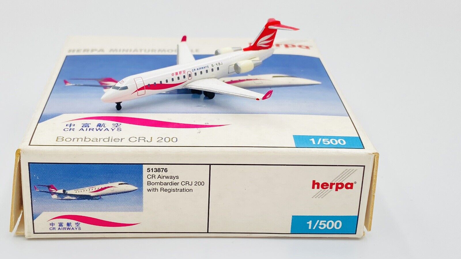 HERPA WINGS (513876) 1:500 CR AIRWAYS BOMBARDIER CRJ 200 BOXED 