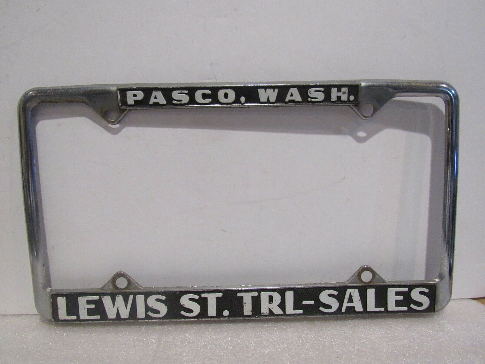Vintage Pasco WA Lewis St Trailer Sales License Plate Frame Metal Embossed