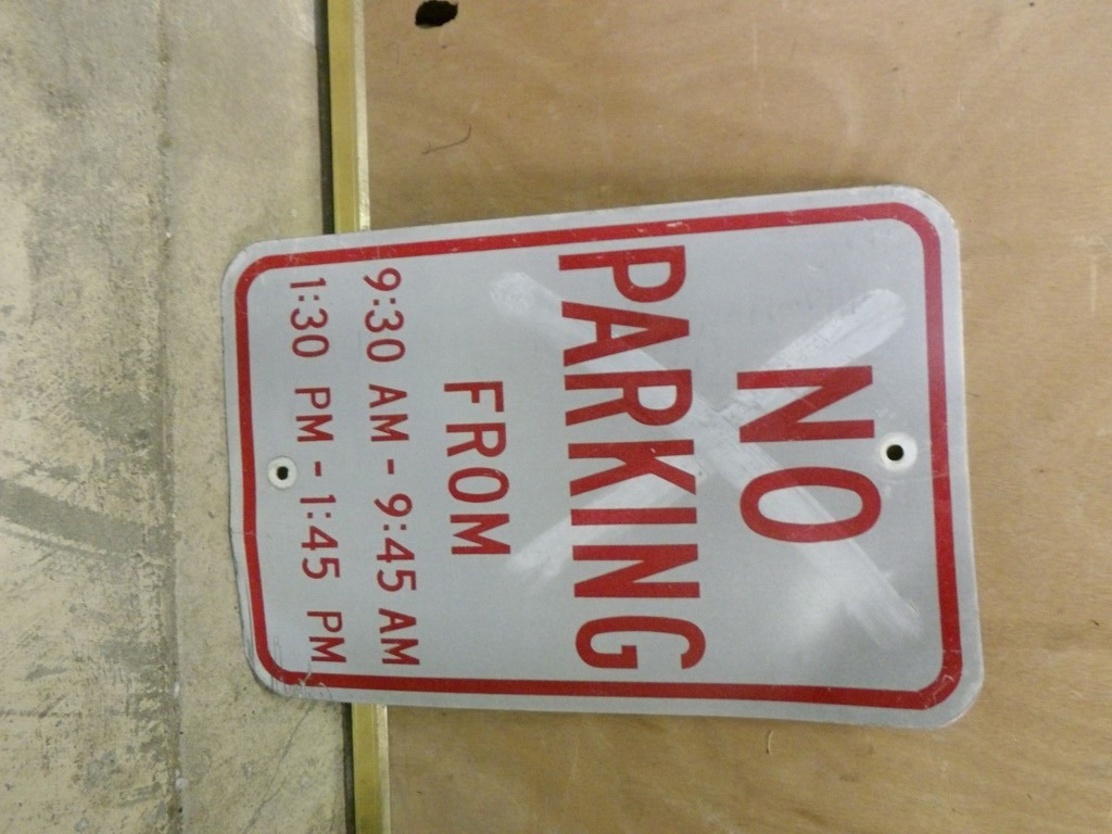 Retired No Parking From 9:30am to 9.15am Sign 12\