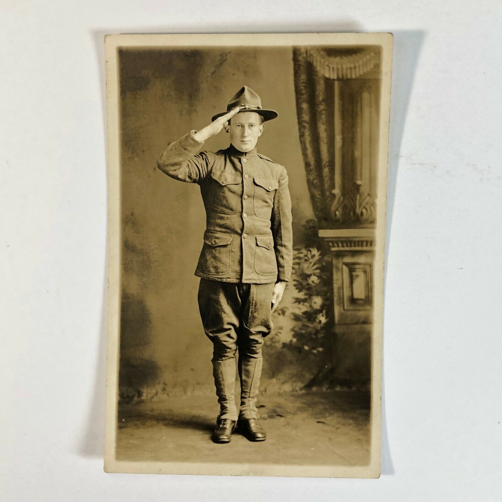 Soldier Full Salute Posing Inside for Portrait Baggy Pants RPPC 1907-1915 