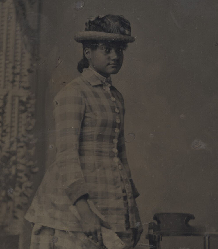 QUARTER PLATE TINTYPE OF WELL-DRESSED AFRICAN-AMERICAN WOMAN