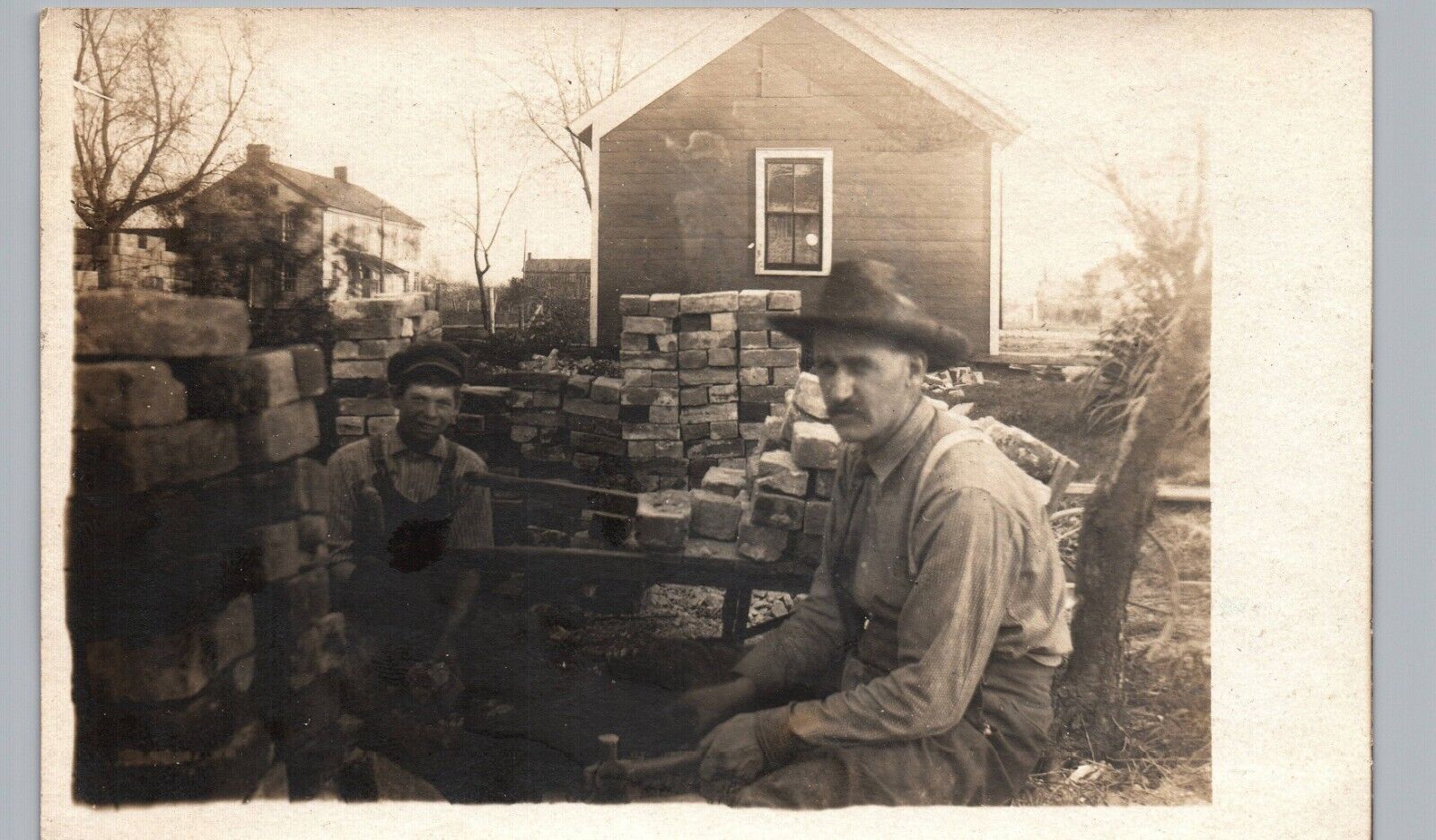 HOUSE CONSTRUCTION CREW brick laying real photo postcard rppc occupational work