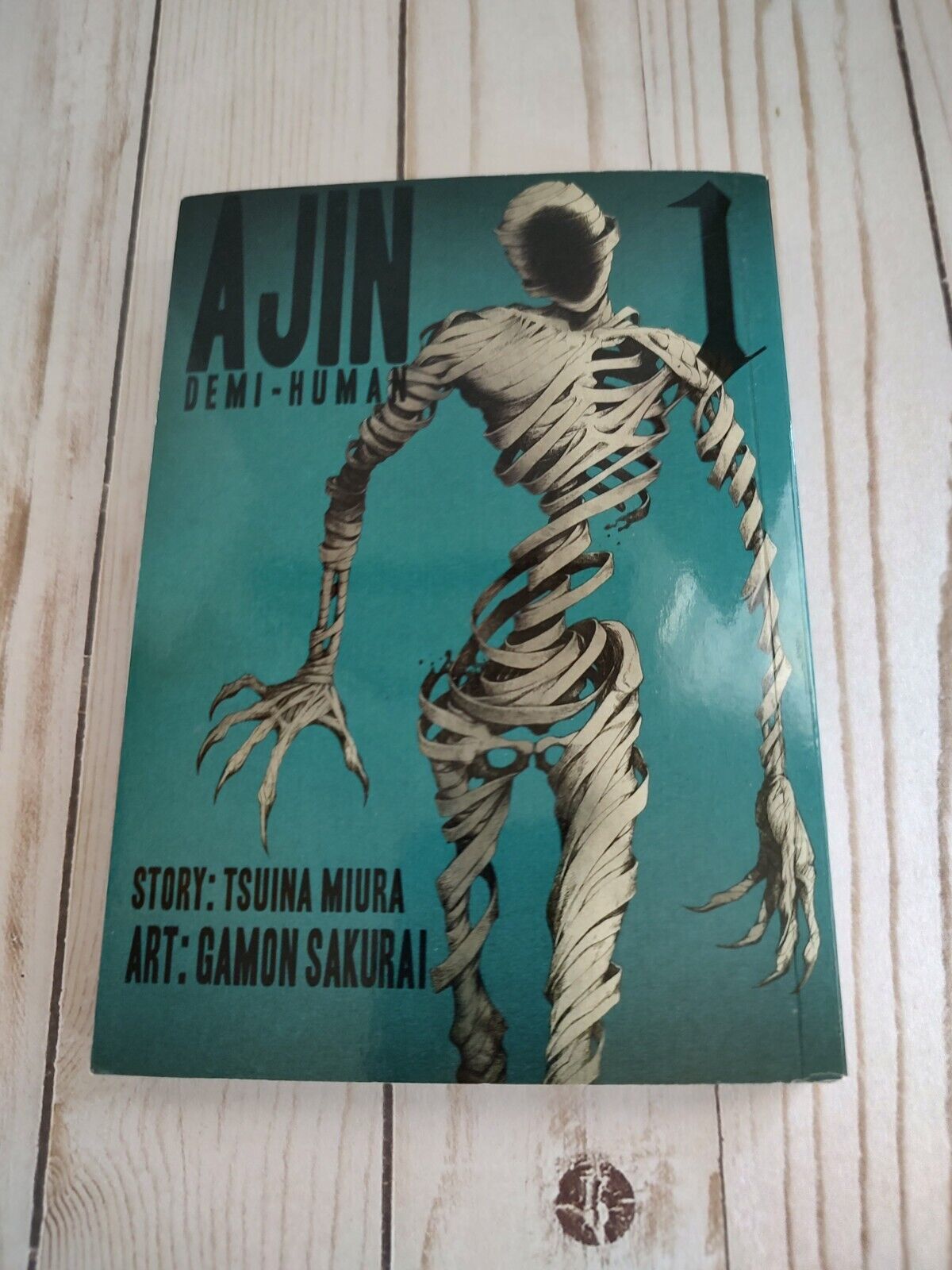 Ajin: Demi-Human #1 (vertical, English, Softcover, Tsuina Miura, Gamon Sakurai)