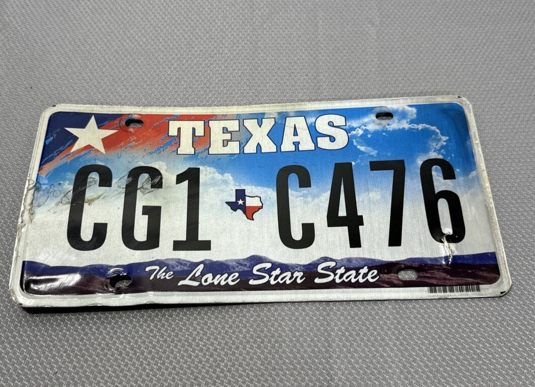 Texas License Plate Car TX 2009 Clouds Lone Star State Flag Used Colors CG1 C476