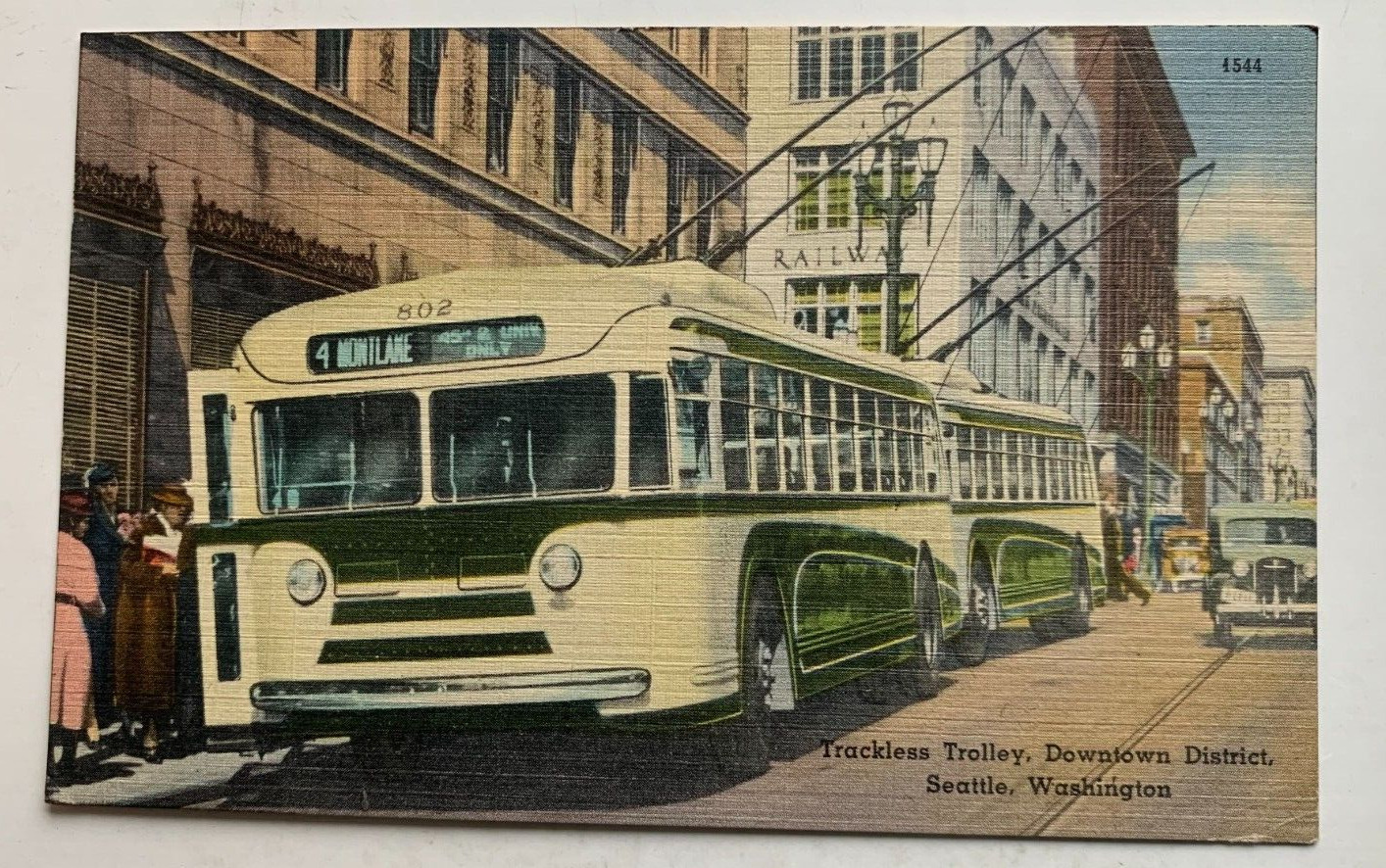 ca 1940s WA Postcard Seattle Downtown District Trackless Trolley Bus Motor Coach