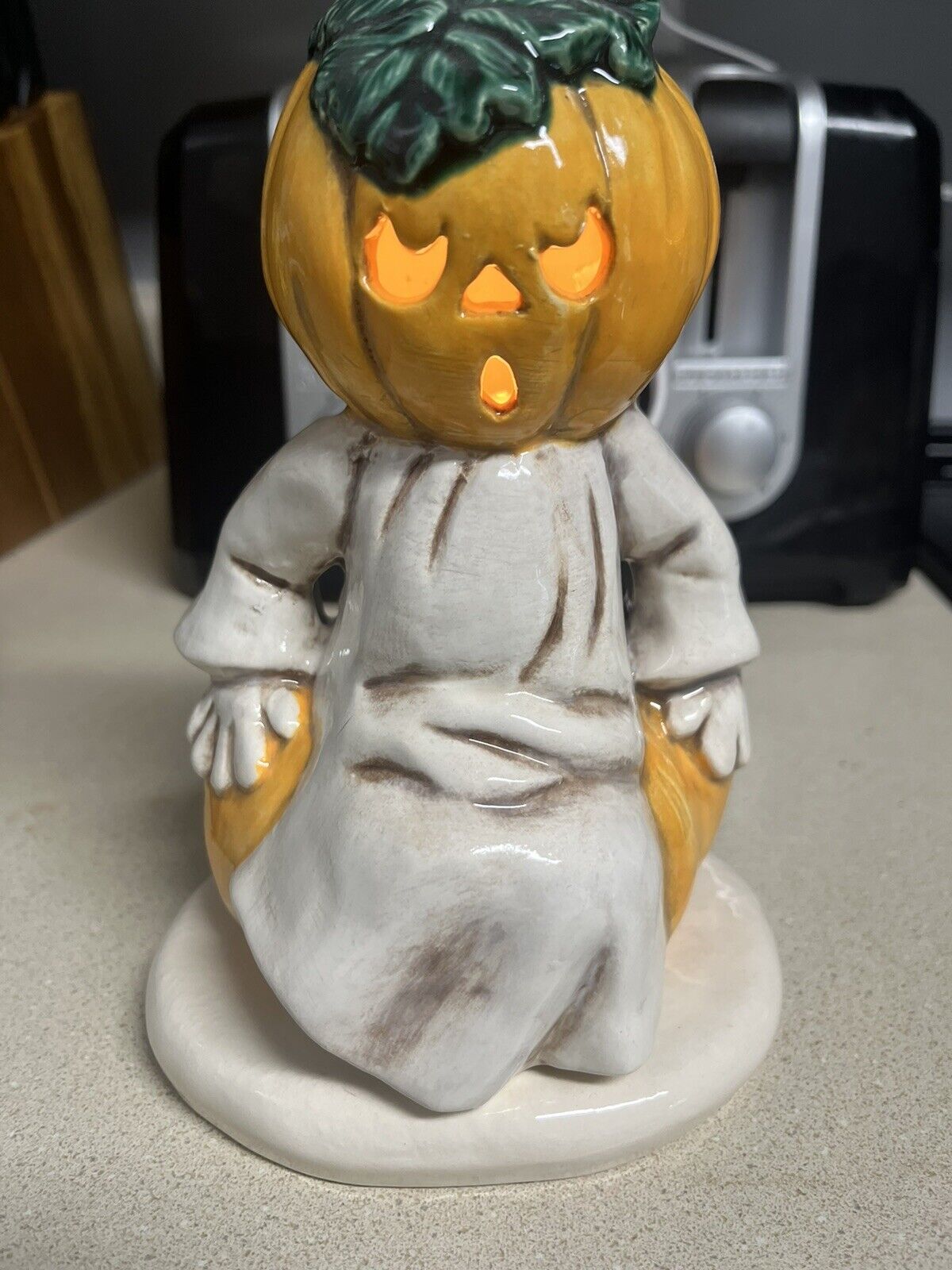 Painted Ceramic Ghost Sitting On Pumpkin Lighted