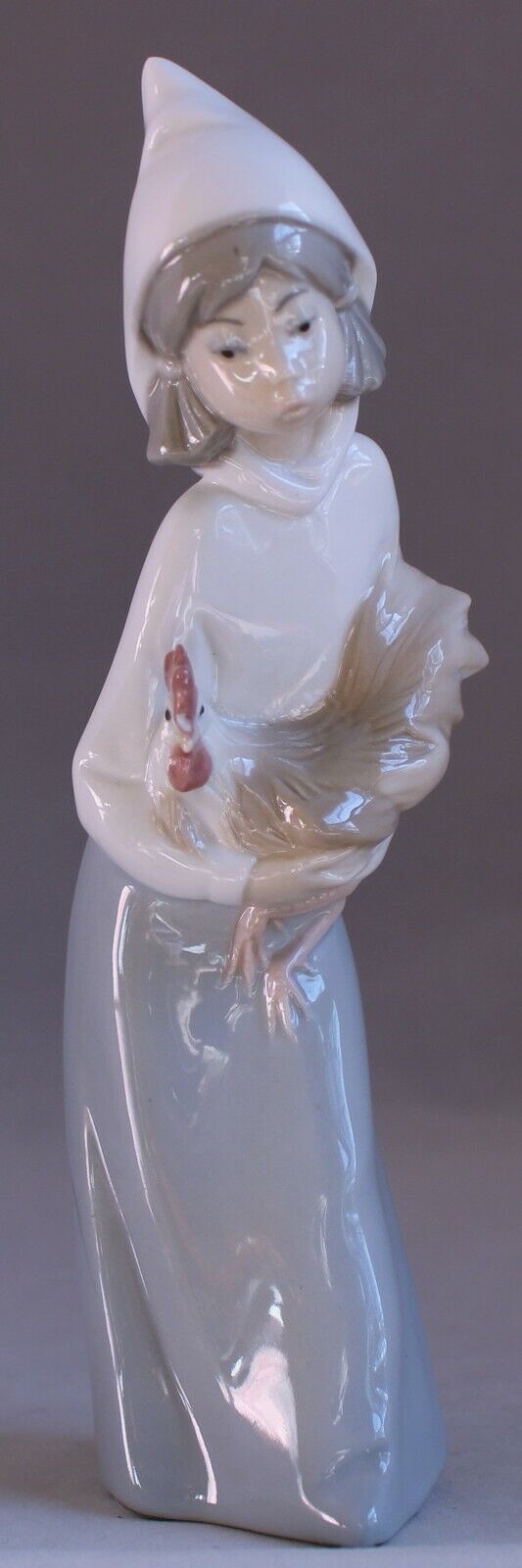 Lladro Glazed Porcelain Girl with Rooster tiny flaw