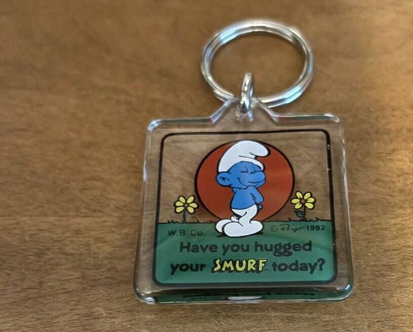 Vintage Smurf Acrylic Keychain.  “Have You Hugged Your Smurf Today”?