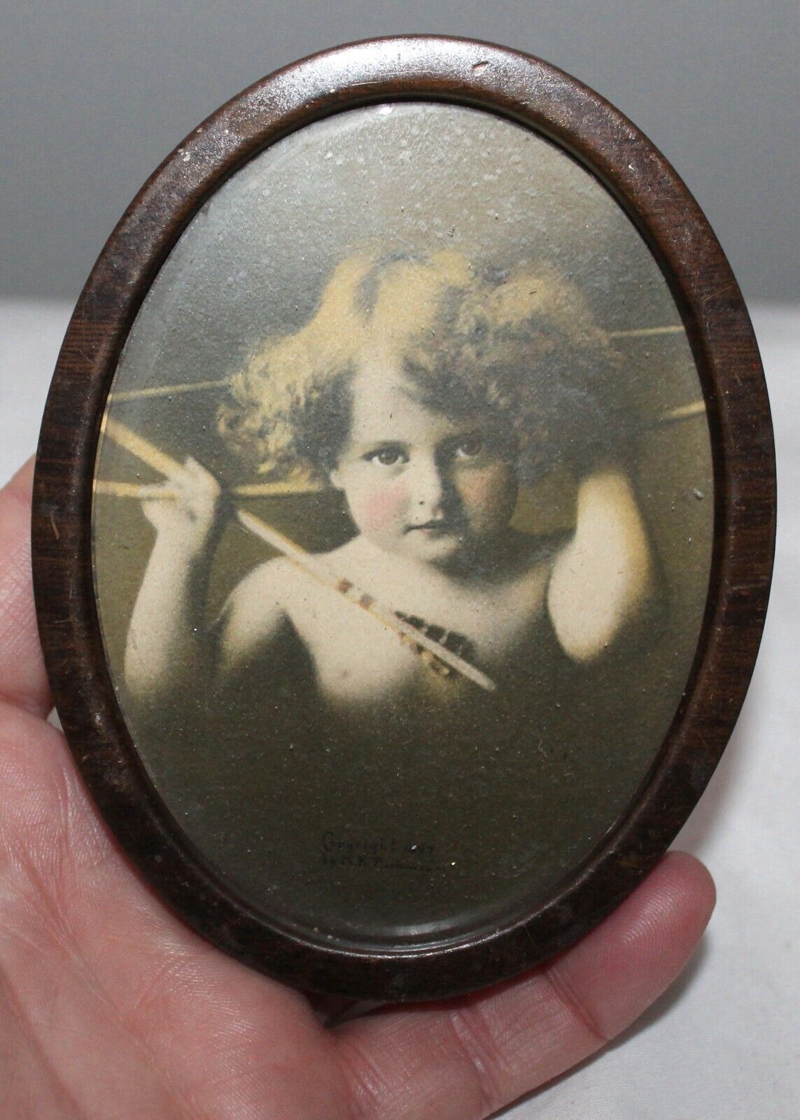ANTIQUE CUPID AWAKE ANGEL TIN METAL OVAL FRAME WITH GLASS 3 3/8\