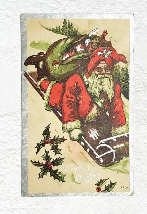 A Joyful Christmas Santa Toys Sled Metallic Highlights Victorian 1910 Postcard