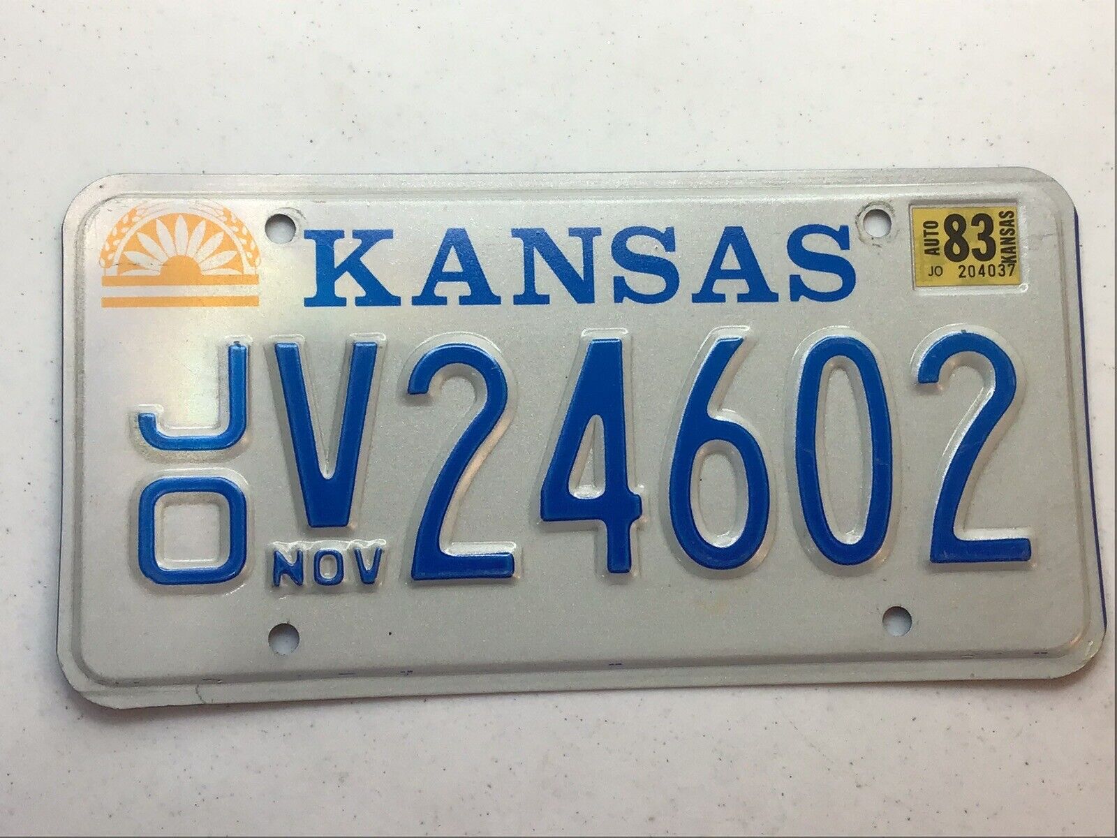 1983 Kansas passenger car license plate Johnson county Tag# V24602 Nov