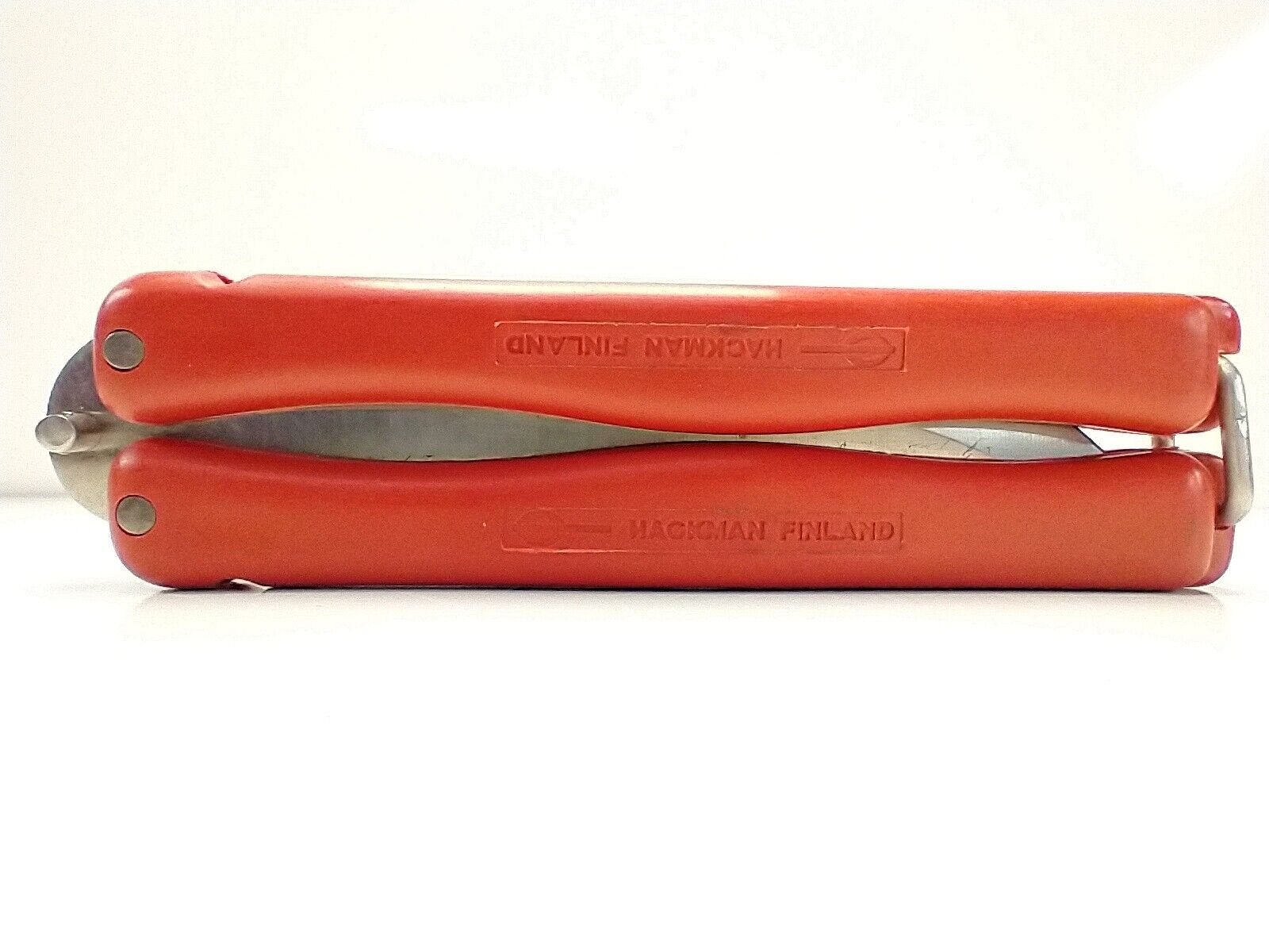 Vintage Hackman Finland Knife, Red Plastic Handles.
