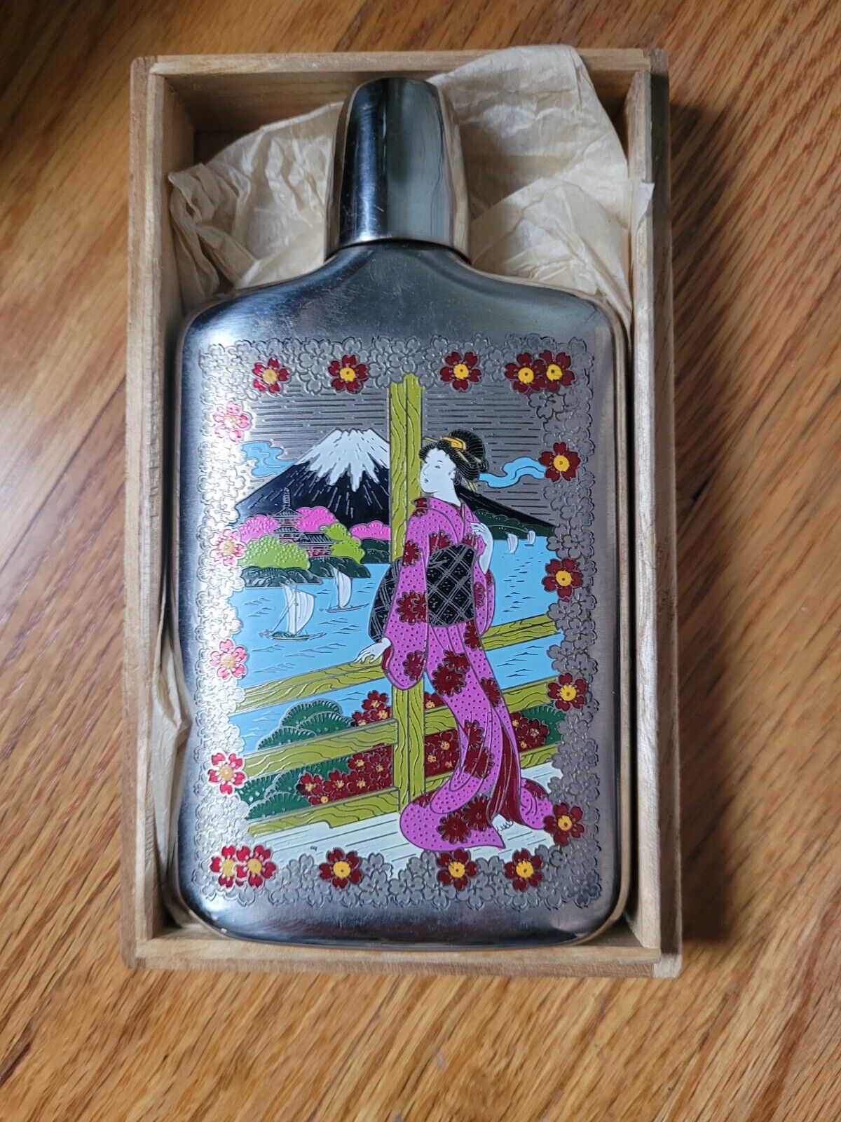 Engraved flask with Geisha Girl and Mount Fuji in background