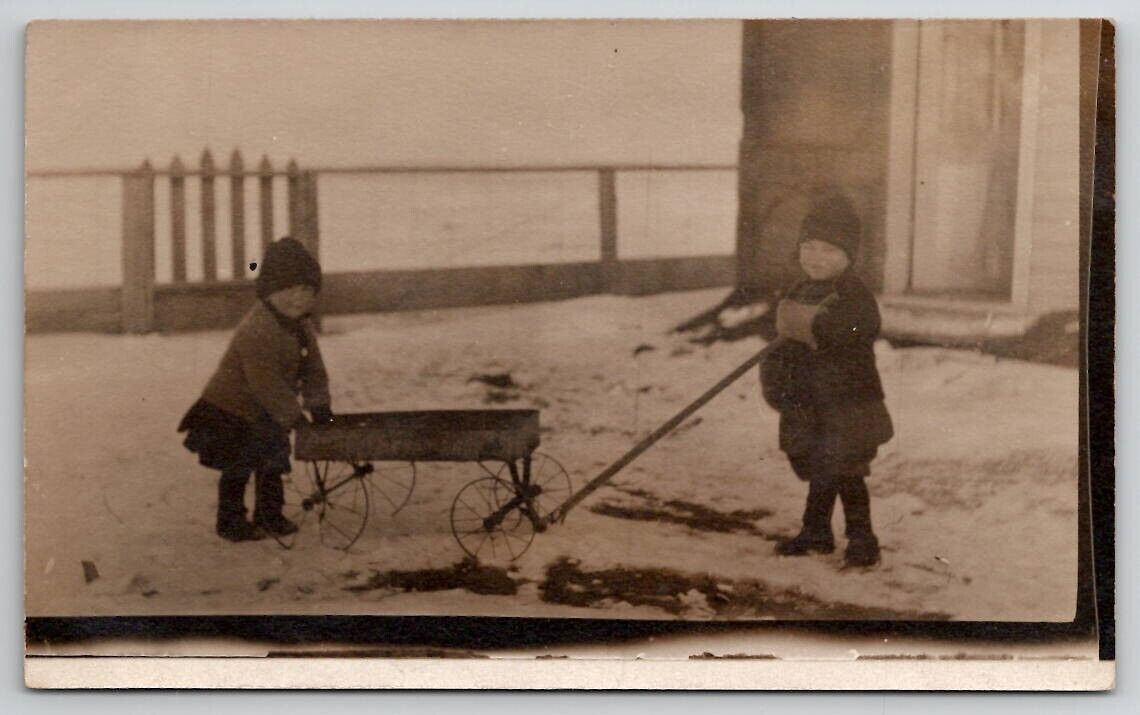 RPPC Cute Children With Wagon in Snow Hats Gloves Coats Postcard E29