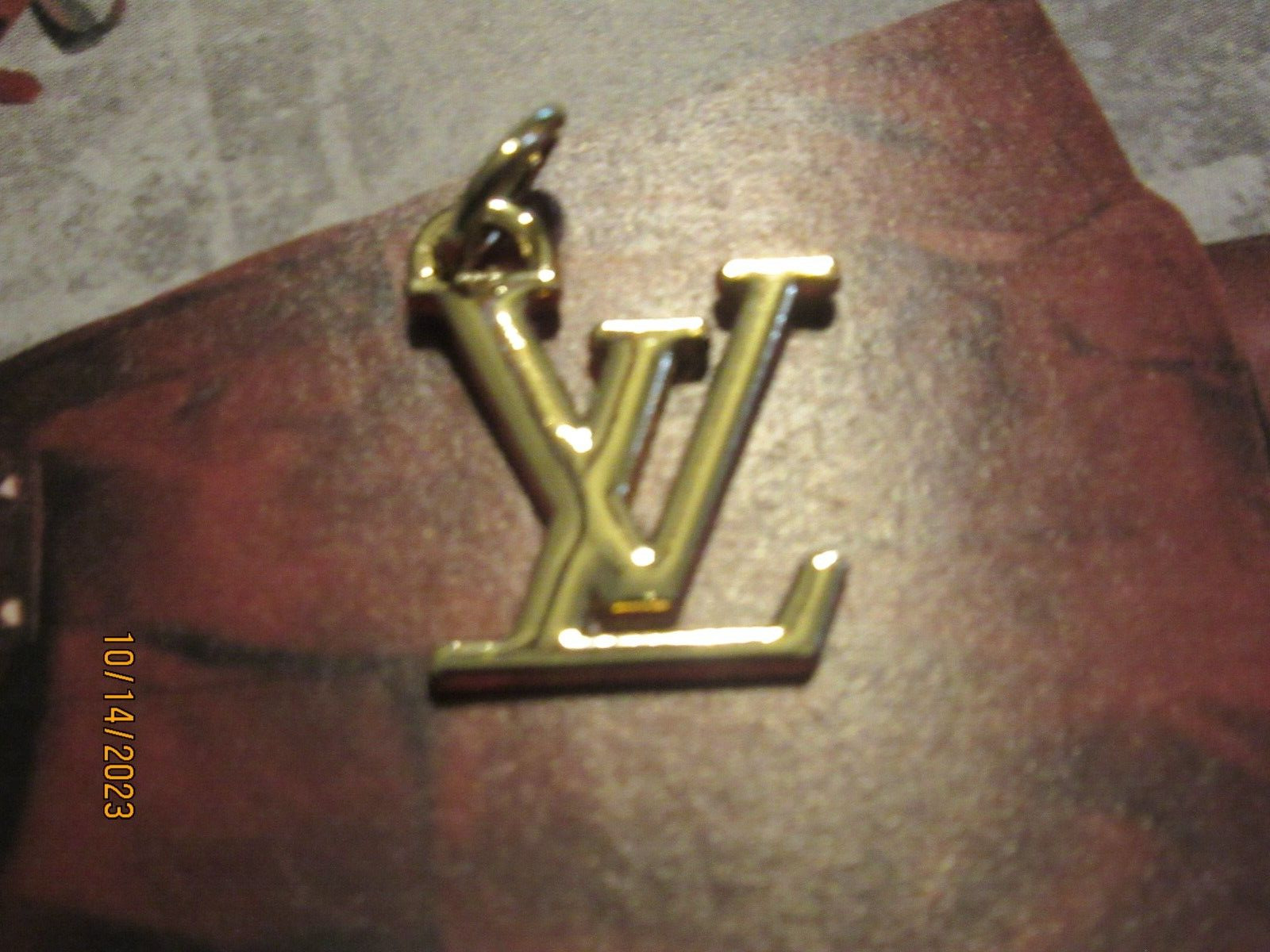 LV LOUIS VUITTON  ZIP PULL  CHARM 18X15MM gold tone, THIS IS FOR 1
