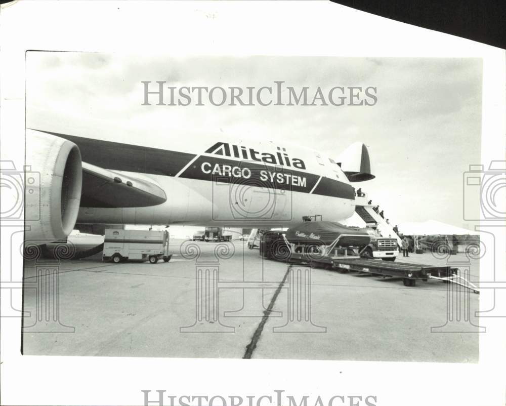 1985 Press Photo Cadillac Car Loaded onto Cargo Plane at Metro Airport