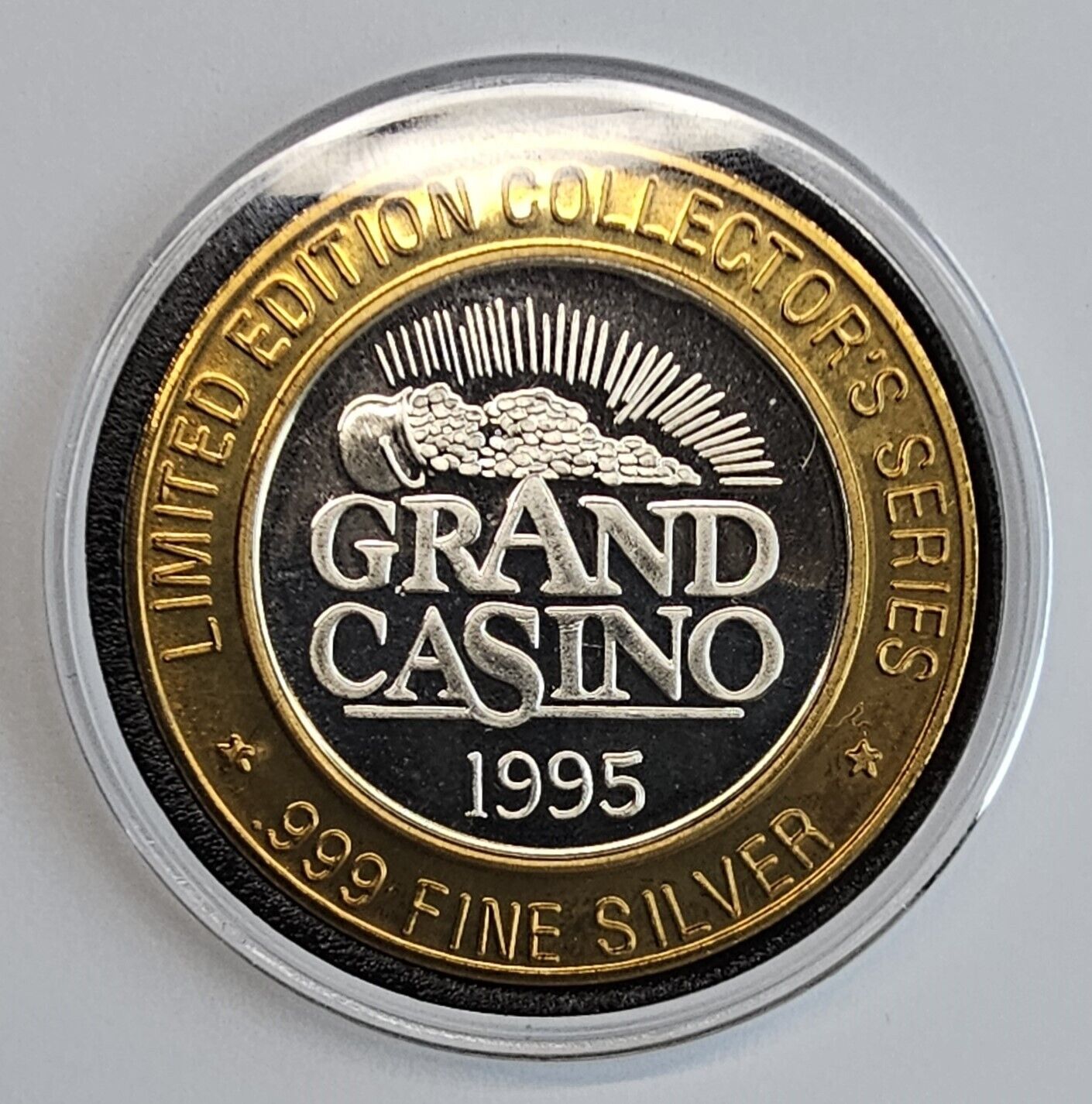 1995 .999 Silver Grand Casino Gaming Token in a Capsule