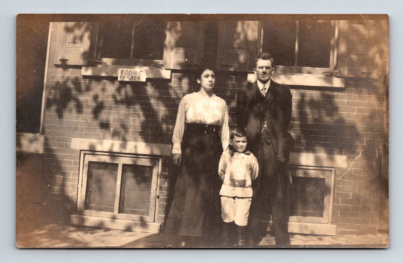 RPPC Family at Brick Home Rooms for Rent Postcard