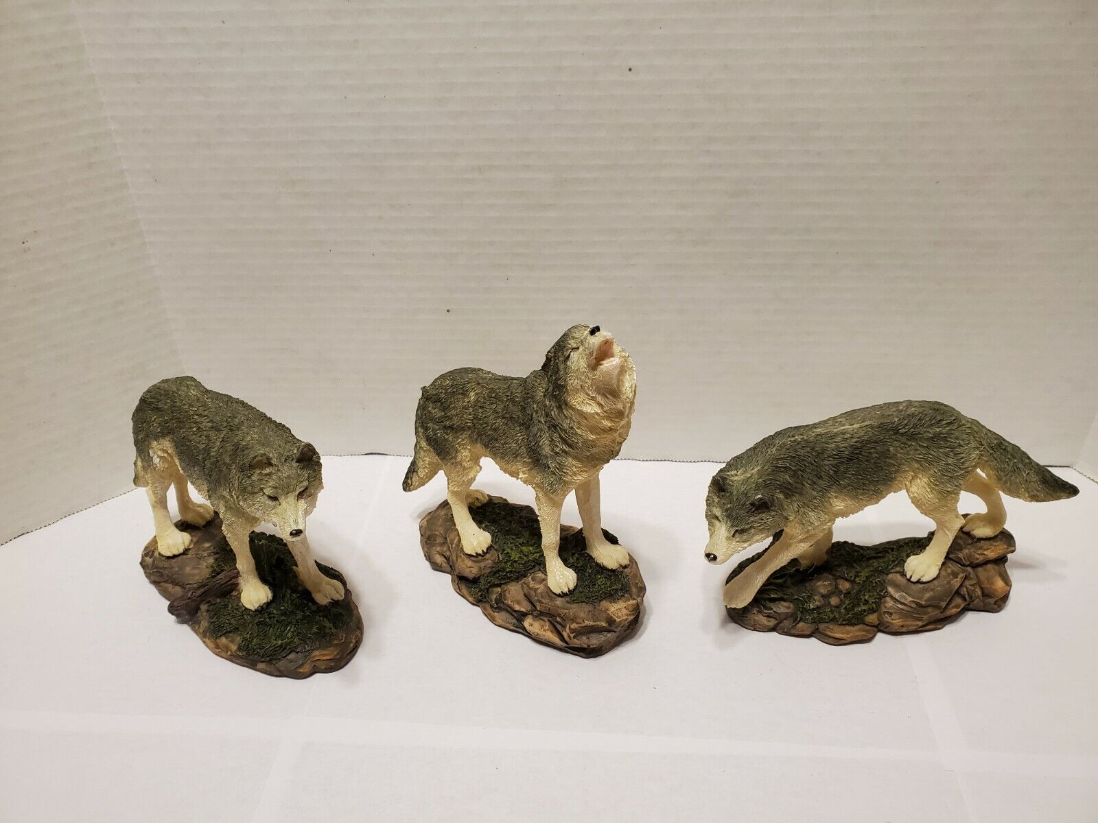 Wolf pack three wild life figurines