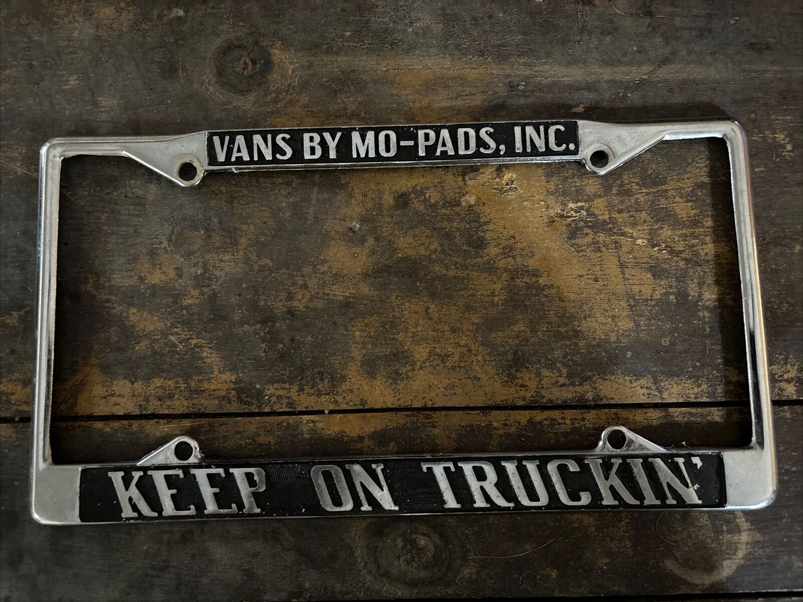 KEEP ON TRUCKIN’  Vintage License Plate Frame Metal Frame VANS BY MO-PADS, INC
