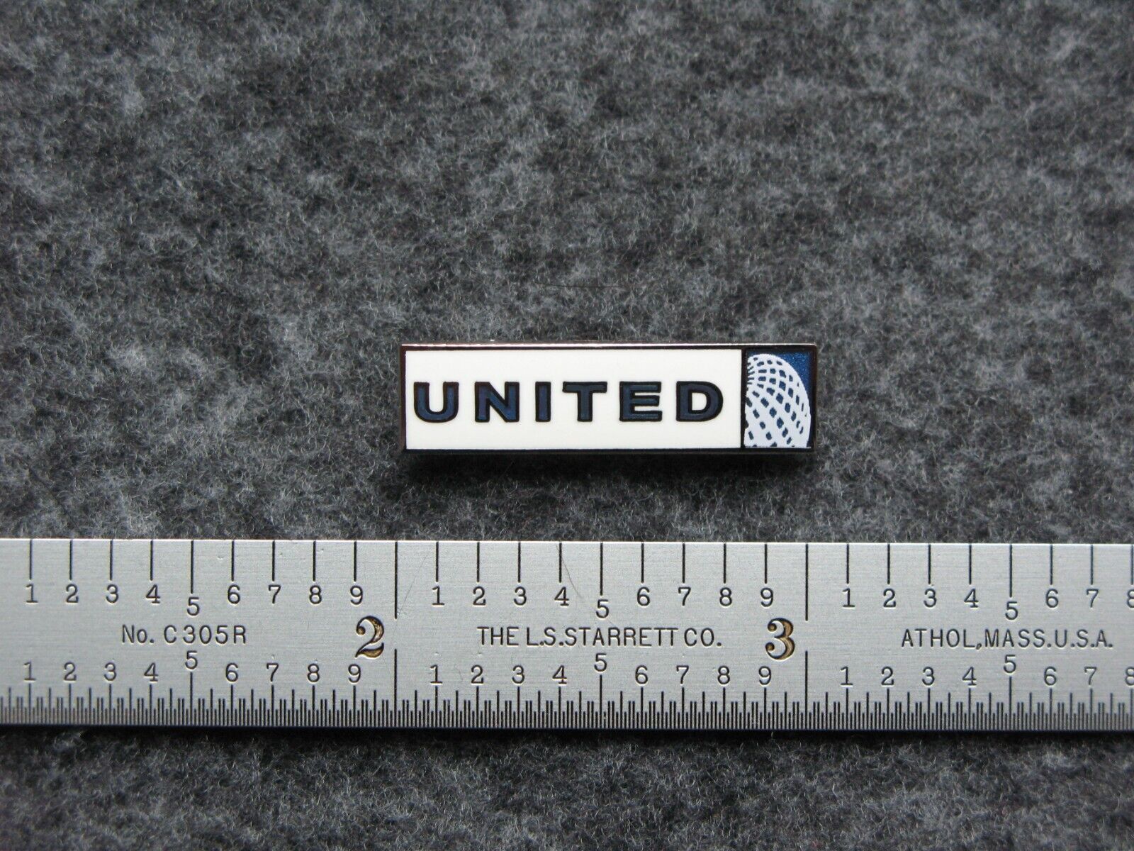UNITED  /  CONTINENTAL  AIRLINES NEW LOGO PIN