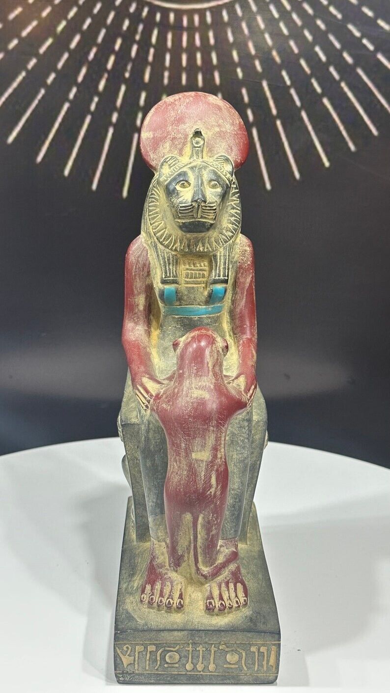 A seated statue of the goddess Sekhmet, the goddess of war and energy