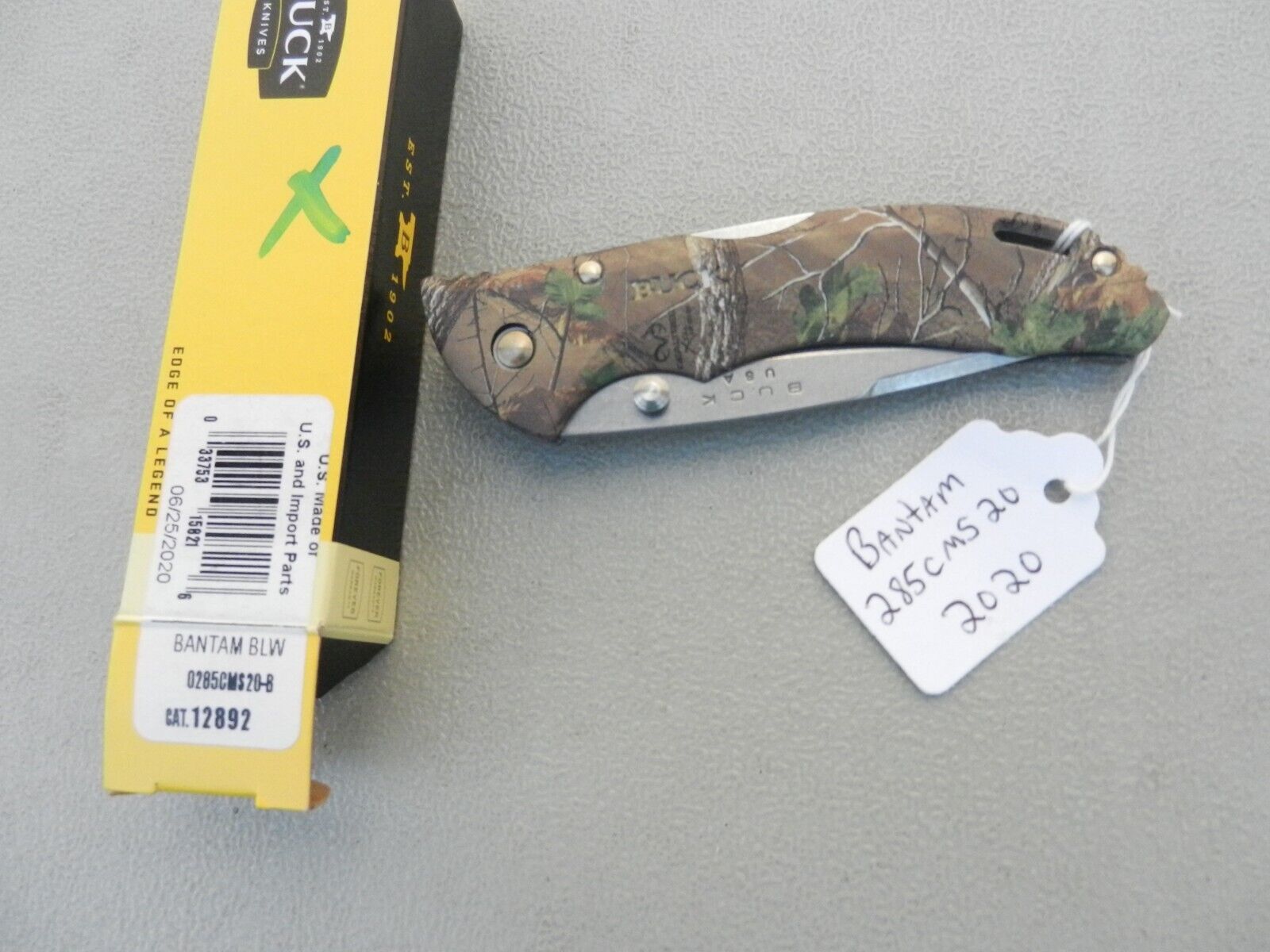NIB 2020 Buck Bantam 285CMS20 Folding Mid Lock Knife Real tree Xtra Green 