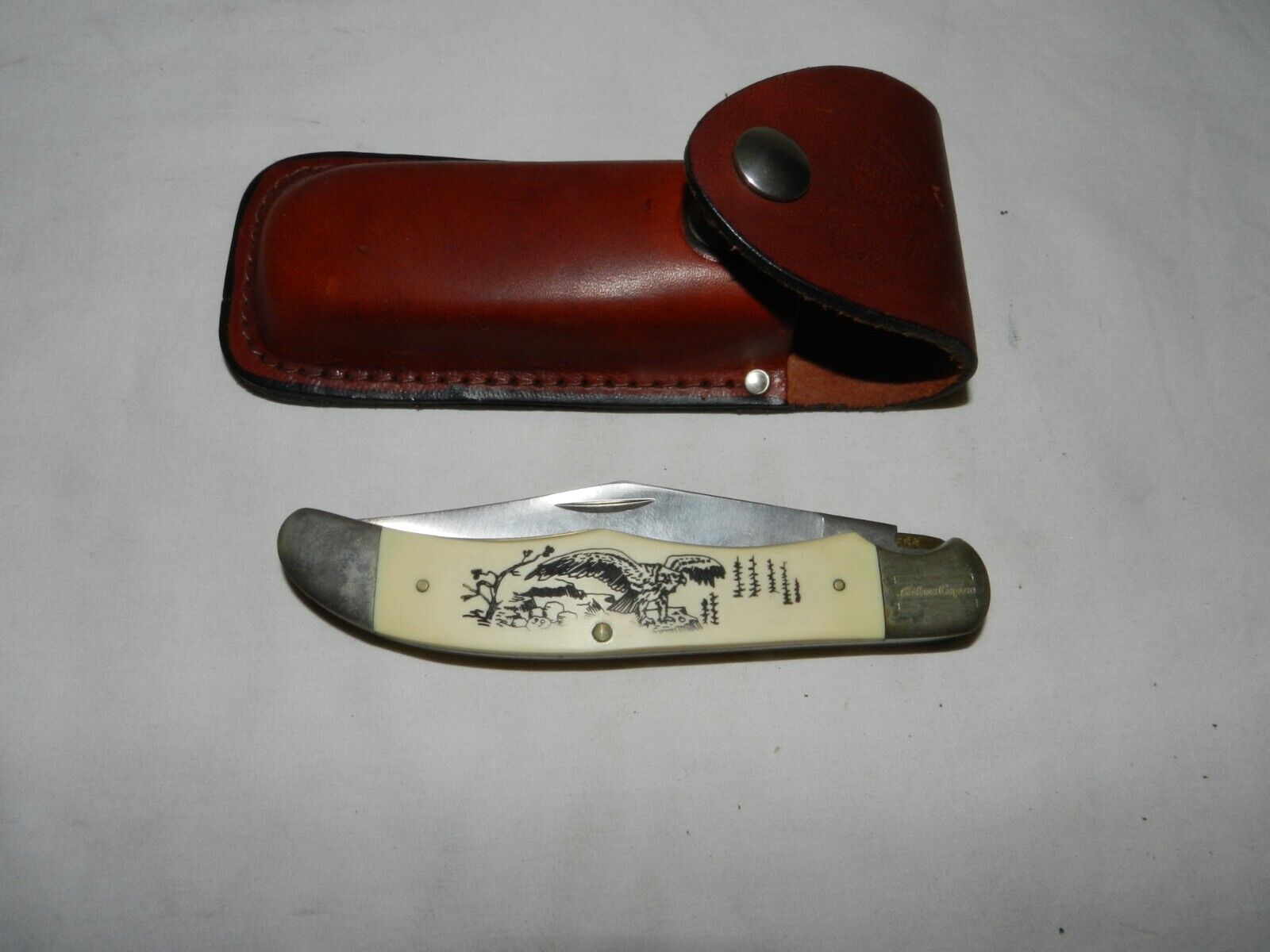 Vintage Shrade USA 127UH  Atlas Copco  Scrimshaw Eagle Pinecone Line Lock Knife
