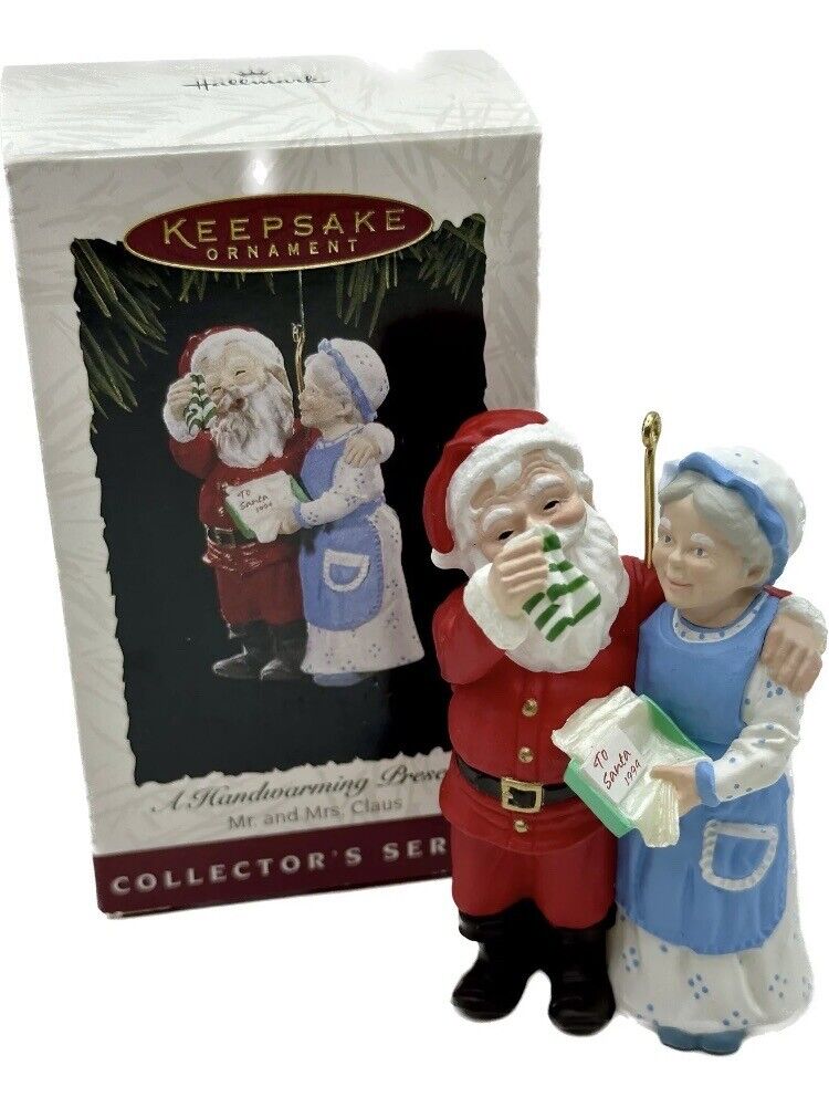 1994 Hallmark Keepsake A Handwarming Present Mr and Mrs Claus Ornament In Box