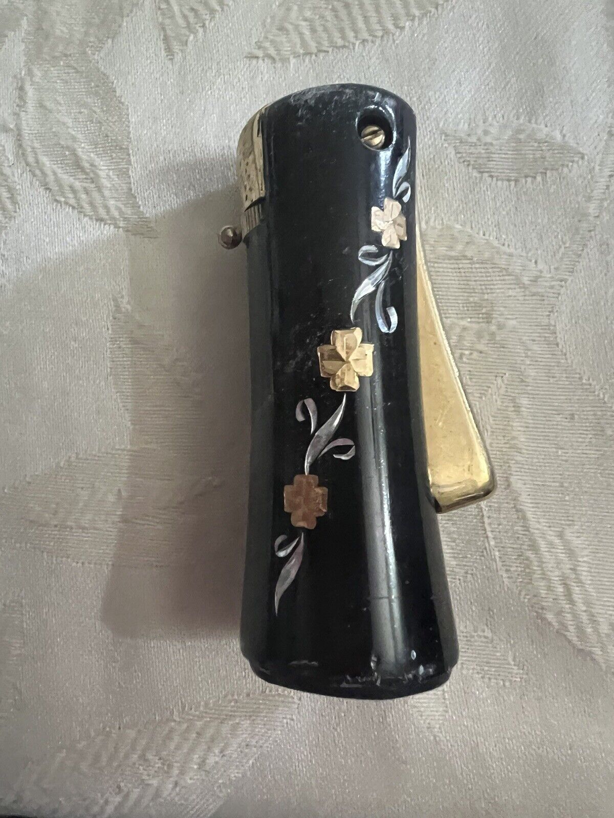Vintage Ronson Varaflame Lady Lite  lighter.  Gold Design On Black Lighter.