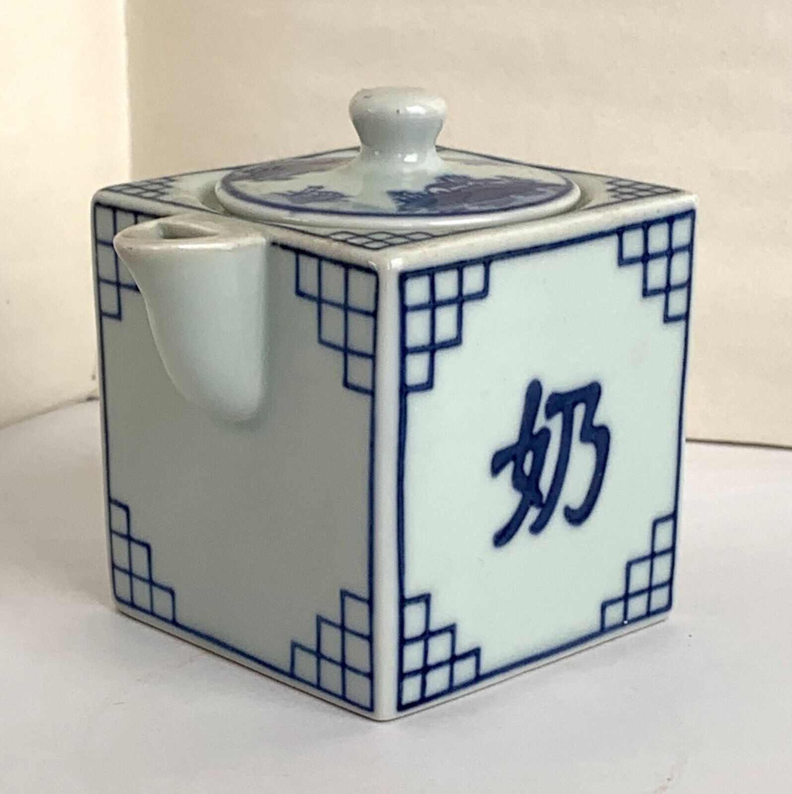 Japanese Blue Tint Porcelain Square Creamer: Landscape Scene, Stepped Squares