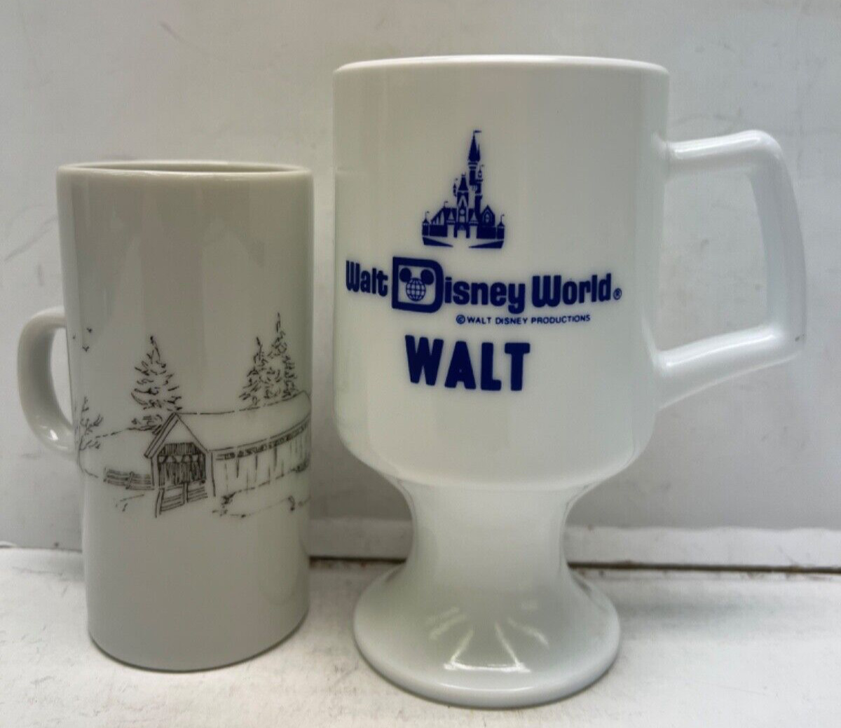two vintage glass mugs walt disney pedestal milk glass & covered bridge scene