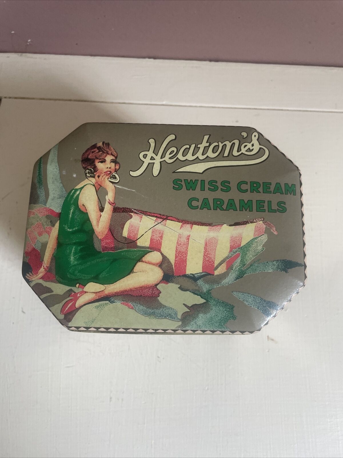 Heaton\'s Swiss Cream Carmels Tin Lid  Pin Up Phone  England Vintage Patina