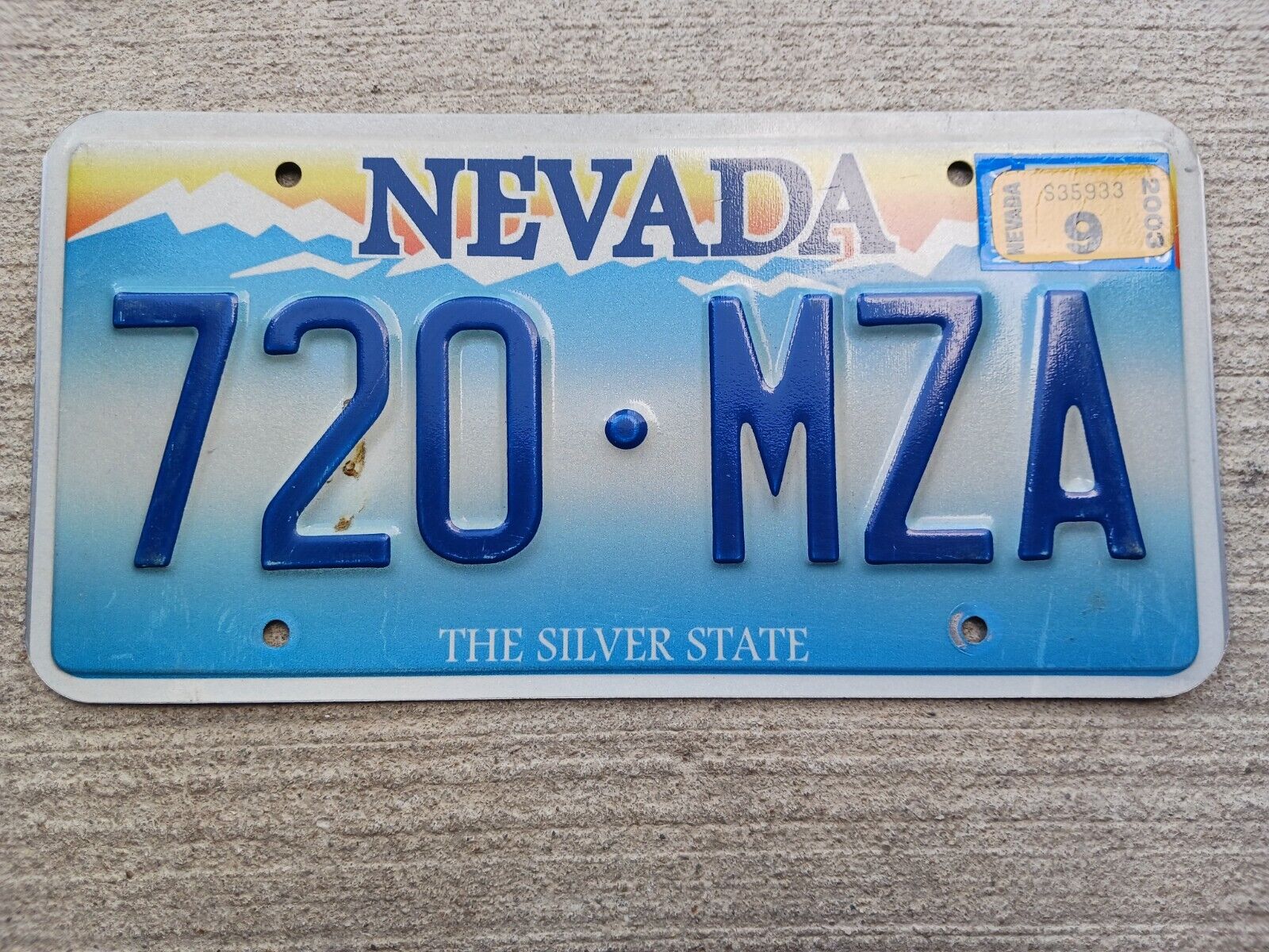 2003 Nevada NV License Plate 720 MZA with Sticker