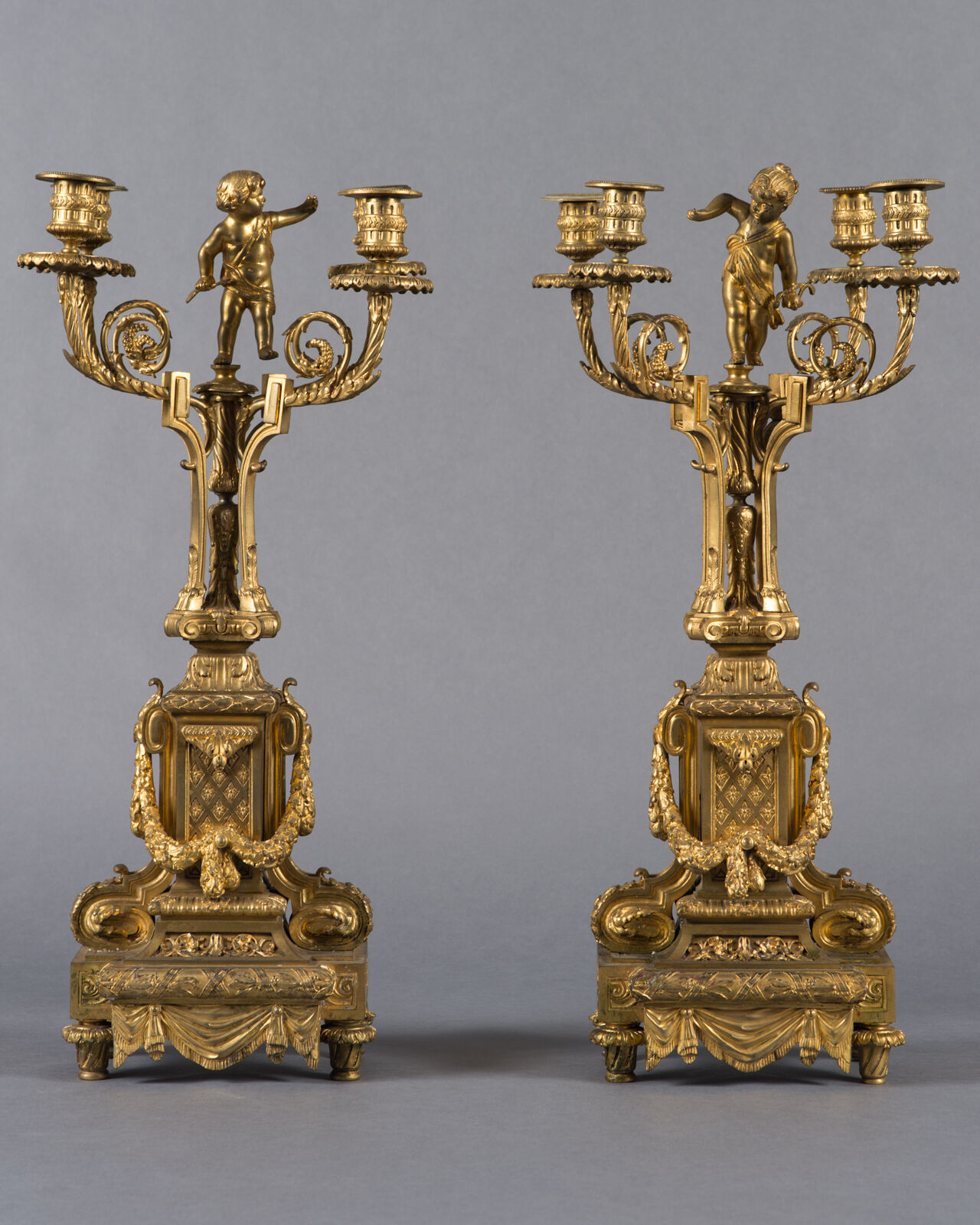 A Pair of Napoleon III French Gilt Bronze Four-branch Figural Candelabras