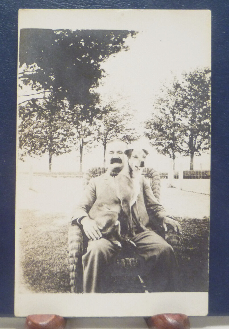 Antique 1907-1914 RPPC Man & big Dog in his Lap, Wicker Chair, Mustache