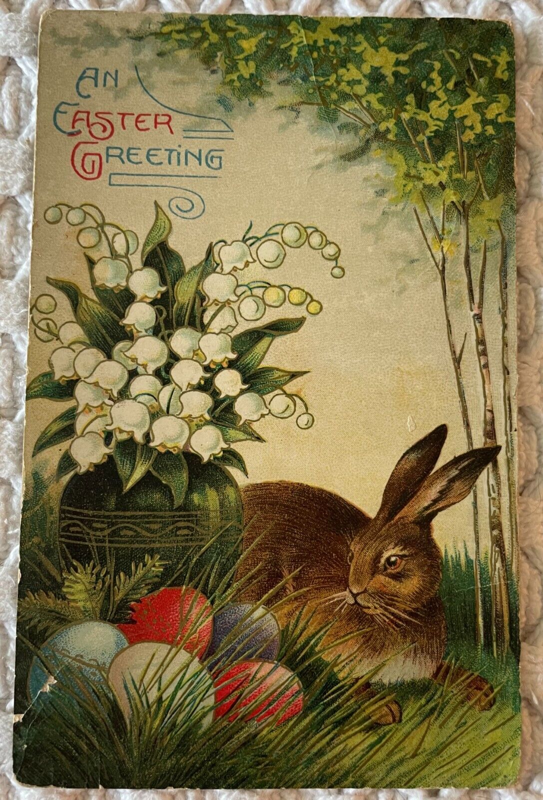 An Easter Greeting Brown Rabbit bunny colored eggs postcard
