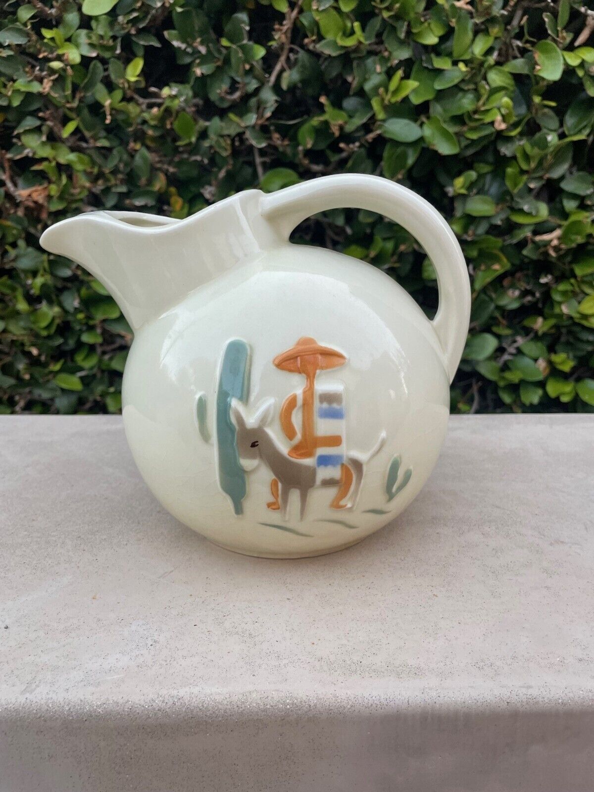 Vintage Porcelier Ball Pitcher with a Mexican theme