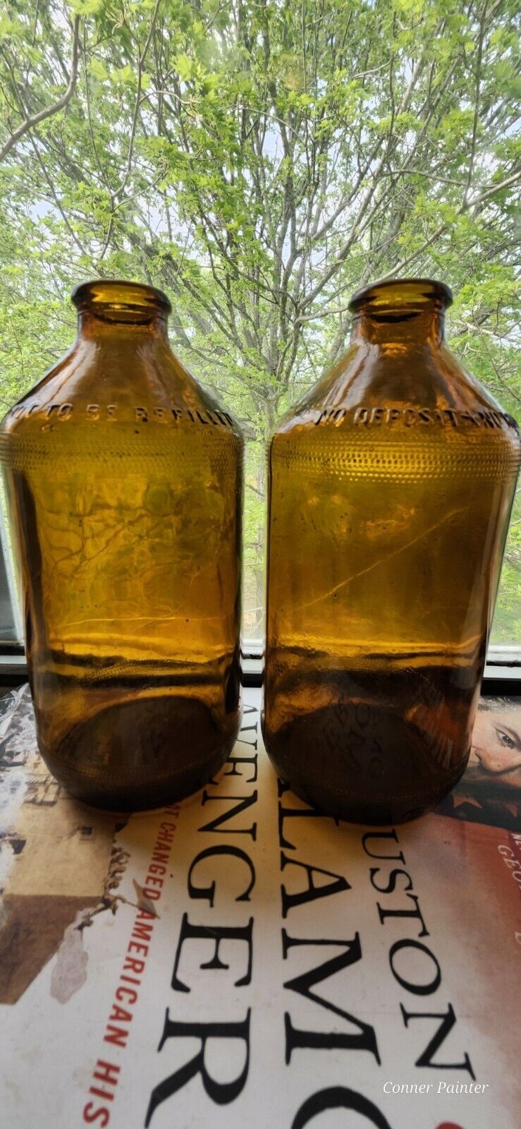 2 Antique 1950s Embossed Amber Beer Bottles