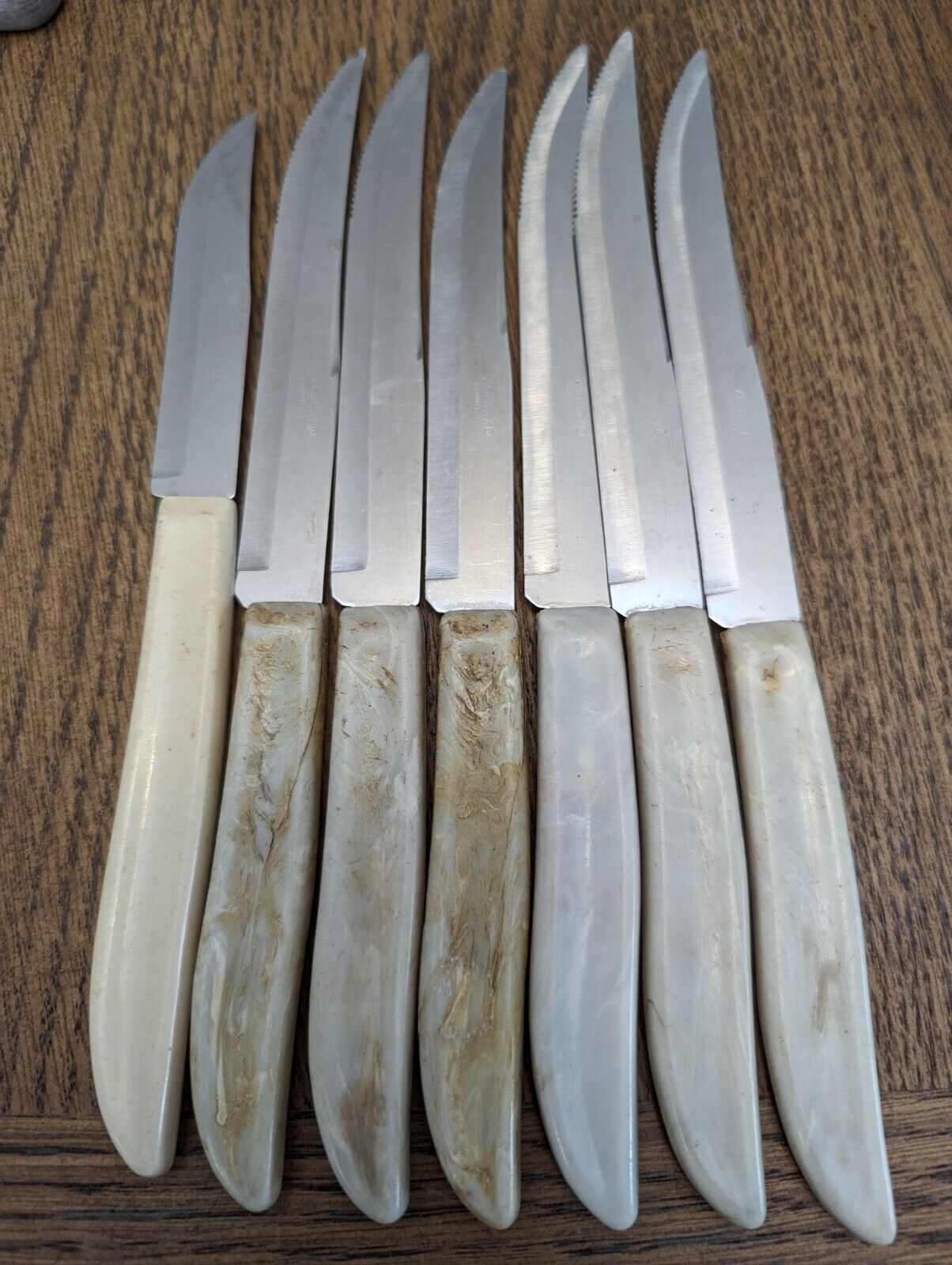 Vintage Quikut Steak Knife Set of 7 Stainless USA Ivory Cream Handles MCM