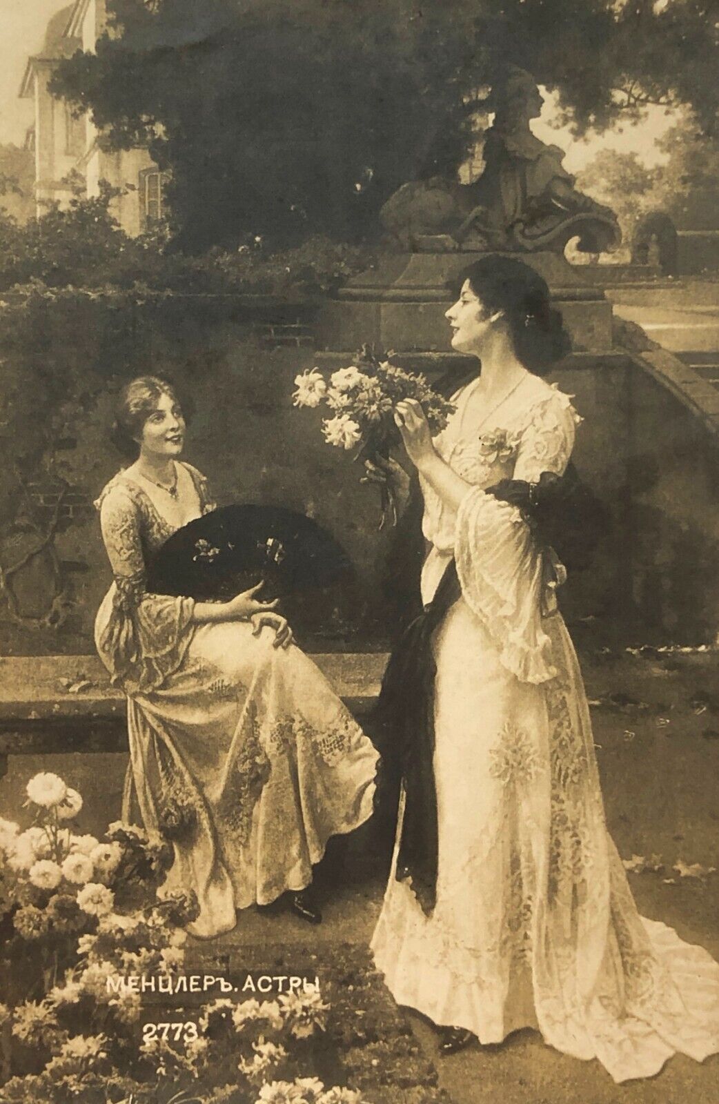 1900s B&W ANTIQUE POSTCARD Two Girls in Park with Asters