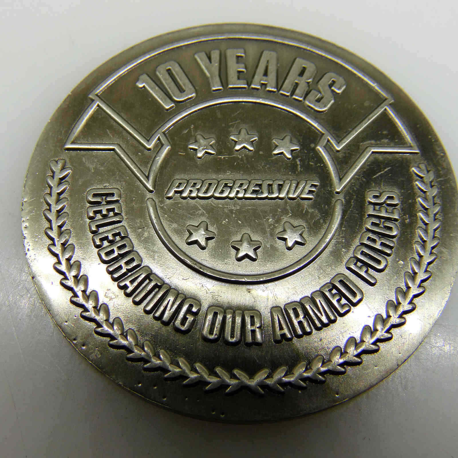 10 YEARS CELEBRATING OUR ARMED FORCES CHALLENGE COIN