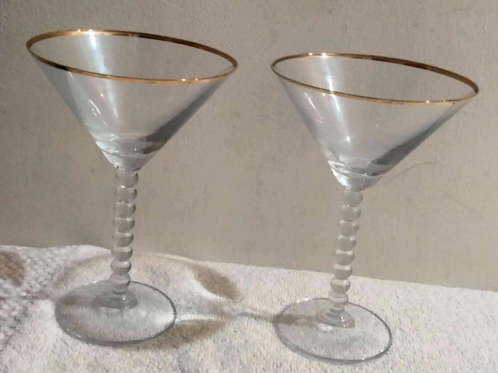 Pair Of Botticelli Martini Glasses With Gold Rims And Stem Of Stacked Balls