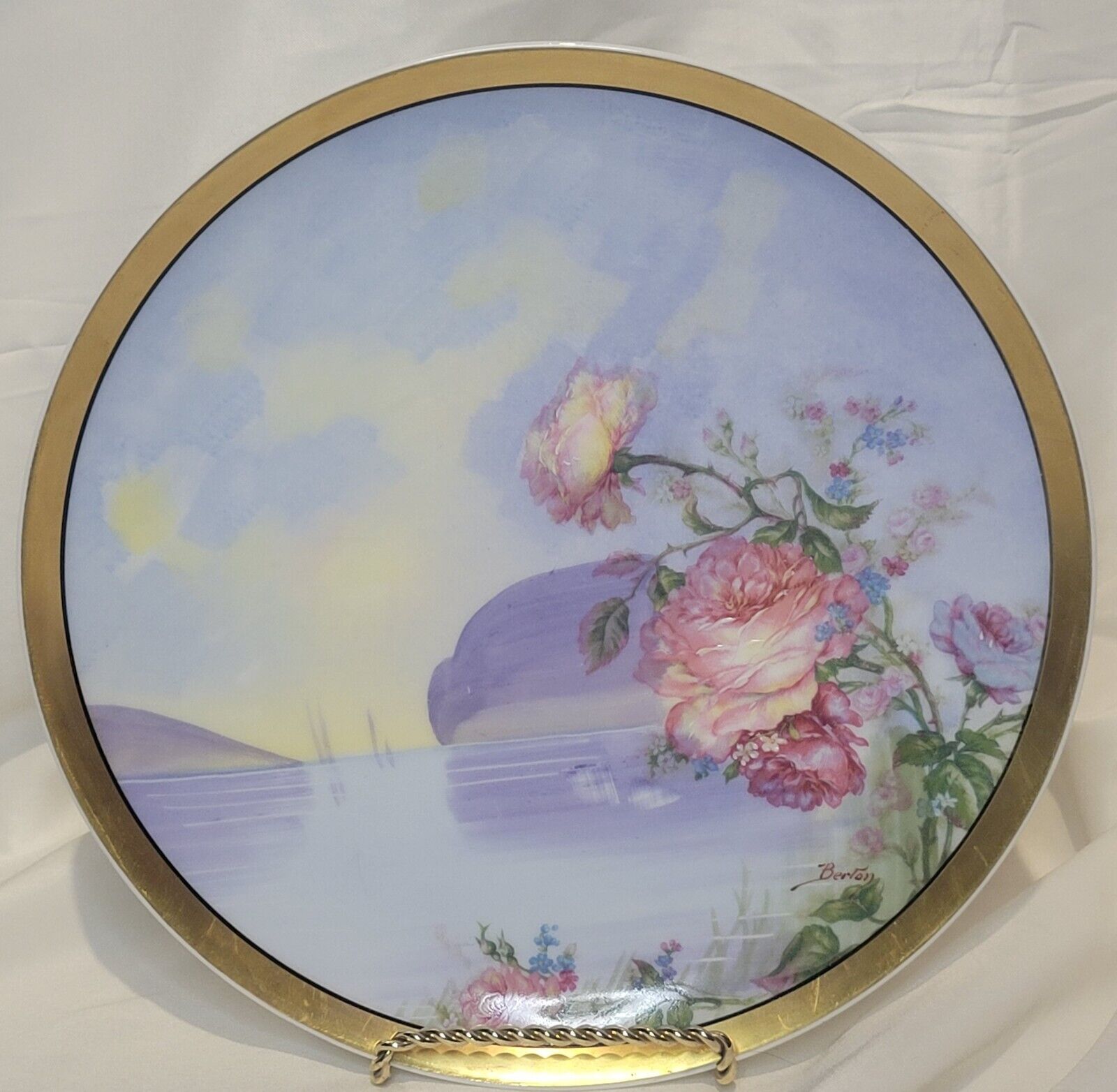 limoges hand painted plate marked Haviland France painted with lake scene