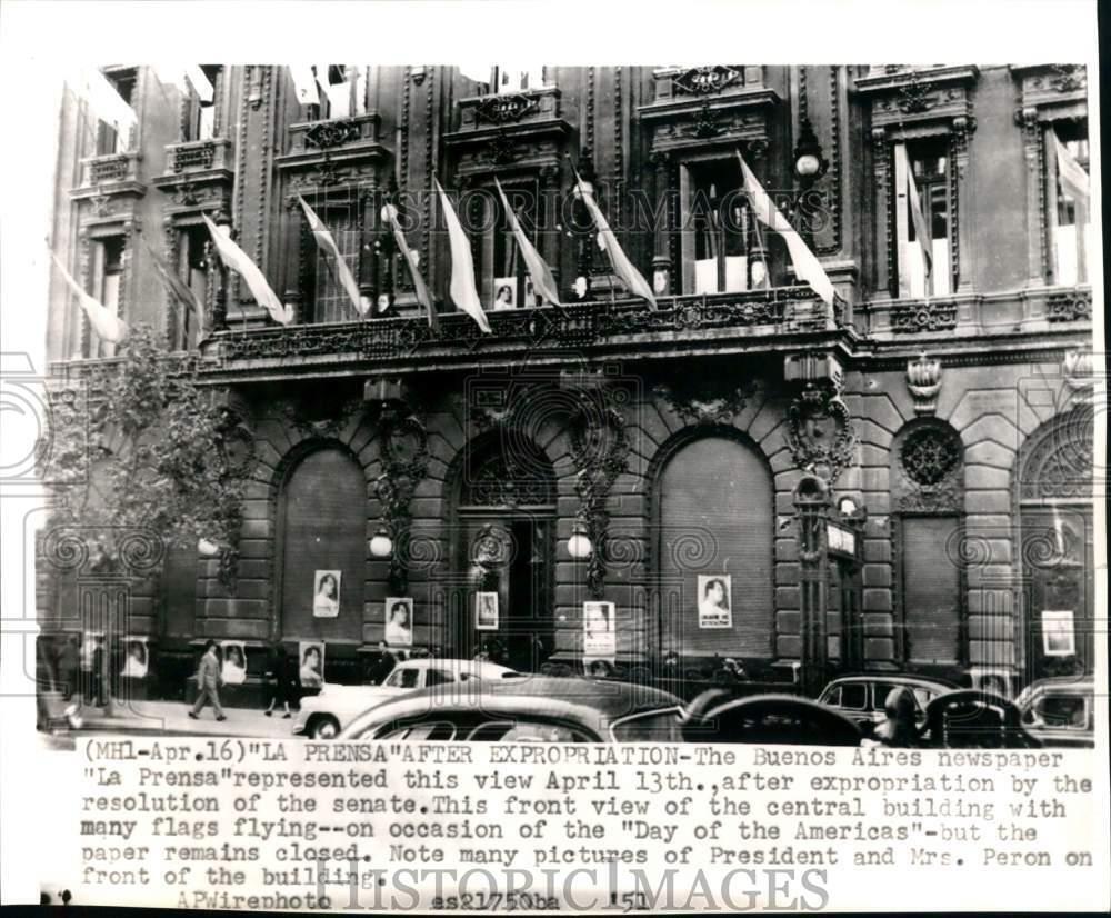 1951 Press Photo Pictures & flags at central building during occasion, Argentina