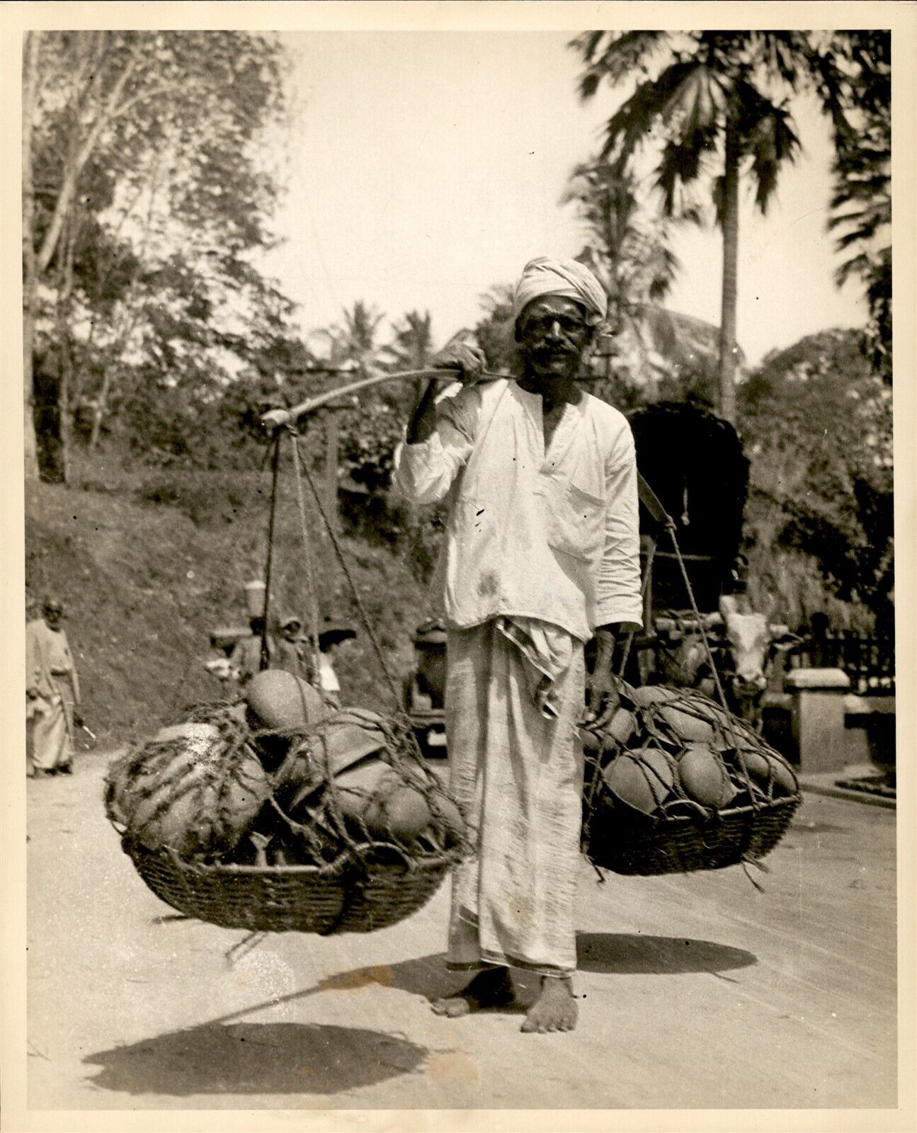 GA100 Original Photo OLD MAN CARRYING BASKETS Heavy Load Barefoot in Street