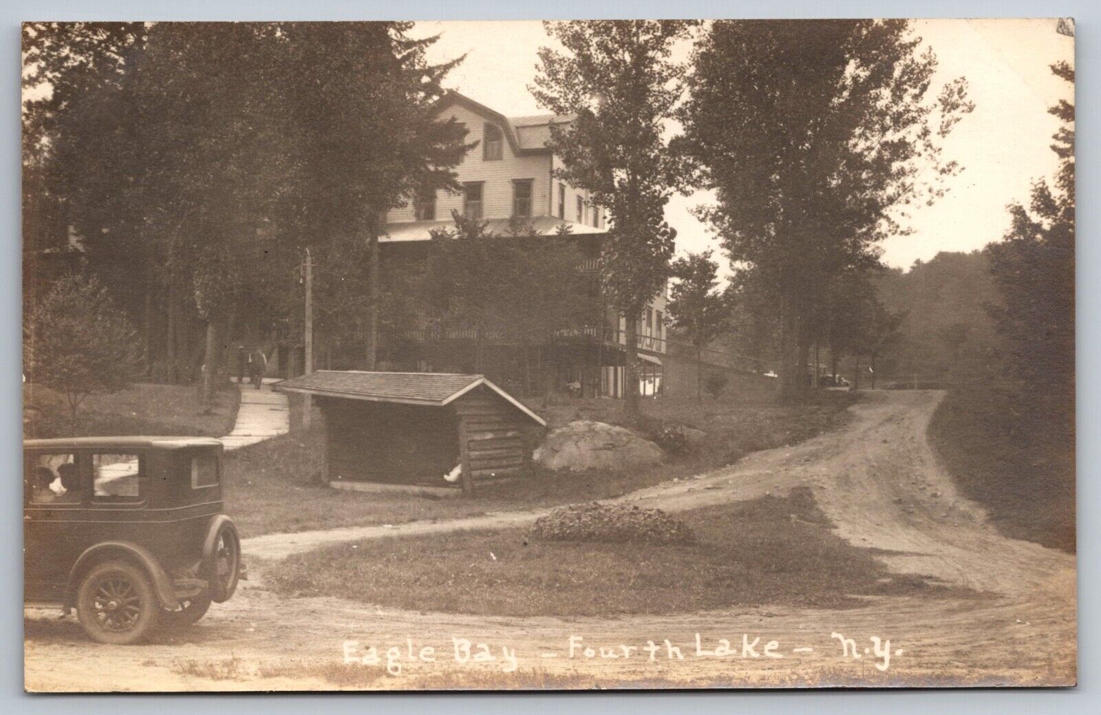 Eagle Bay. Fourth Lake. Vintage Car in Front. New York Real Photo Postcard RPPC