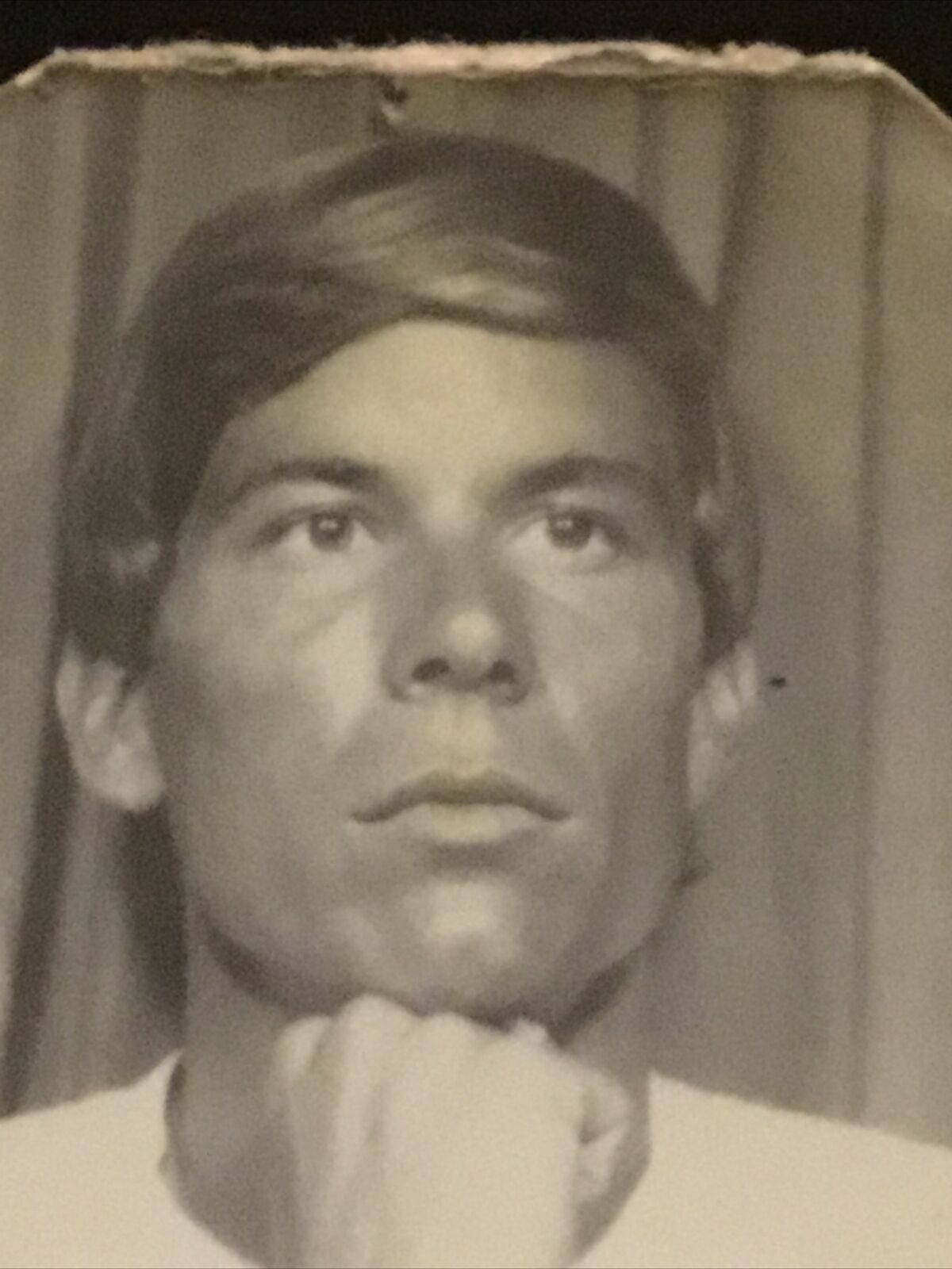 unique vintage photobooth photo of young contemplative Andy Warhol